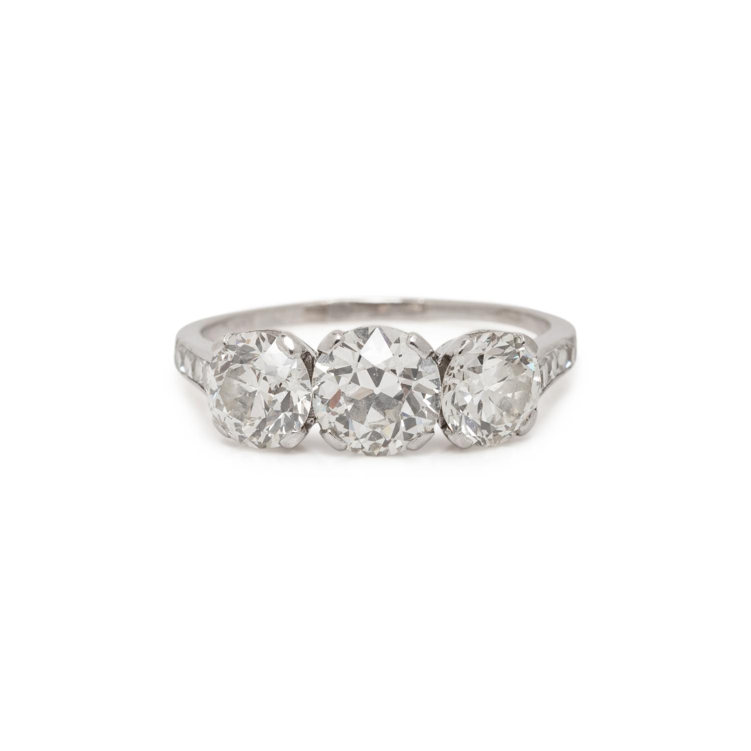 ANTIQUE, THREE STONE DIAMOND AND PLATINUM RING
