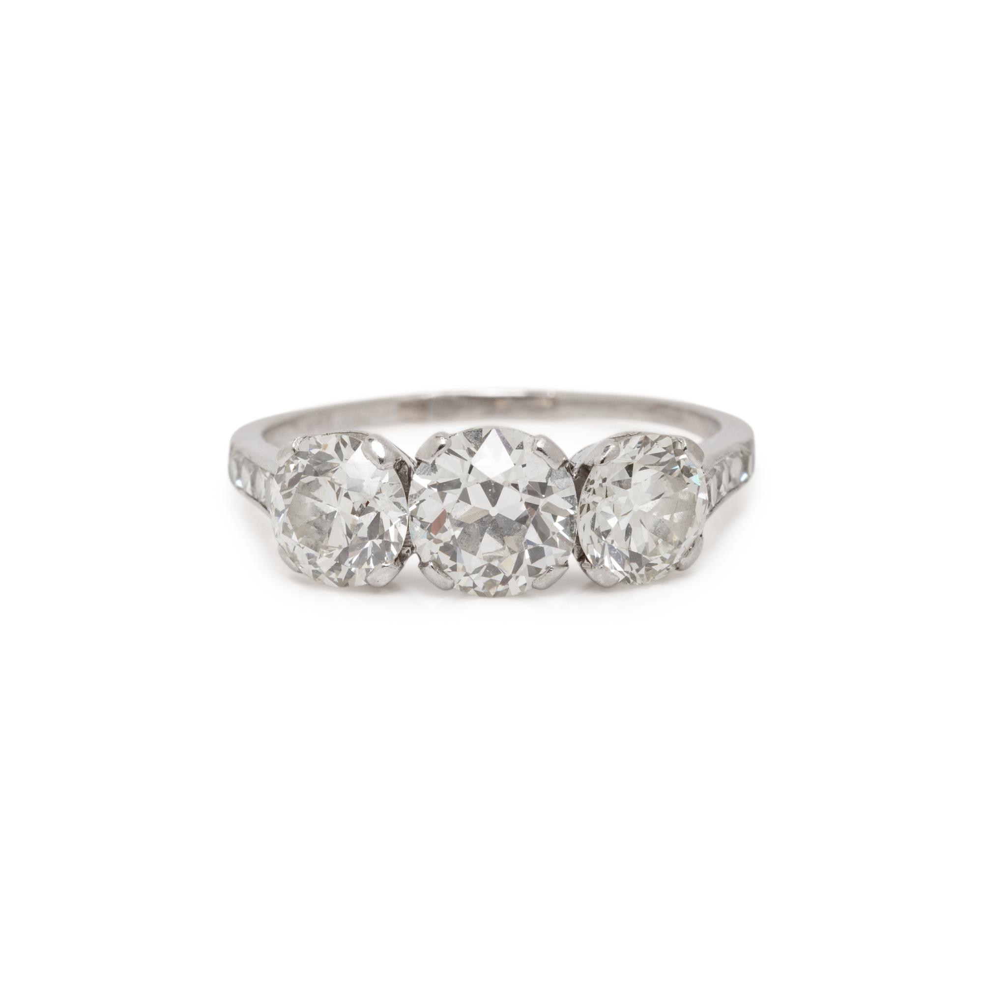 ANTIQUE, THREE STONE DIAMOND AND PLATINUM RING