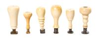 A Collection of Turned Ivory Seals, Height of tallest 3 1/2 inches.