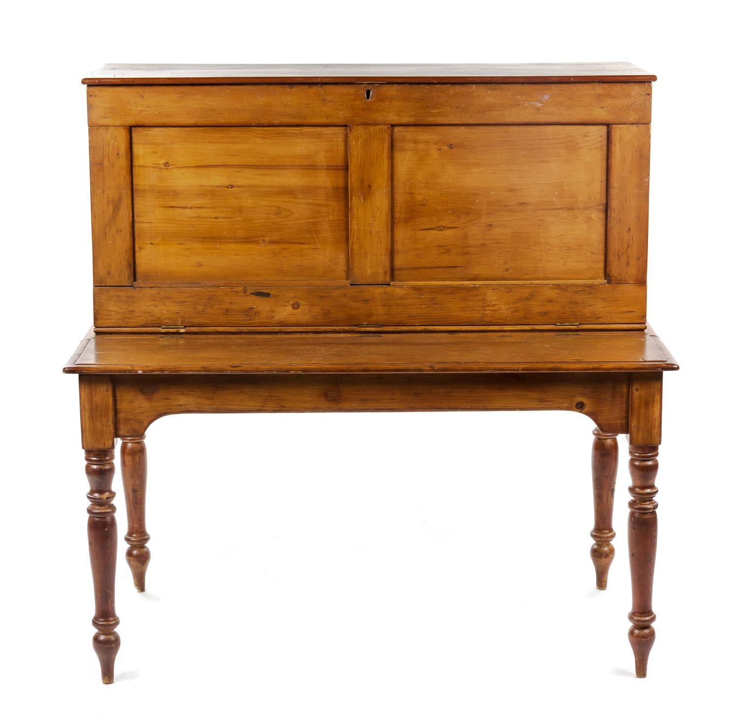 An American Pine Schoolmaster's Desk, MID-19TH CENTURY, Height 50 1/2 x width 48 3/4 x depth 29 1/4 inches. — MID-19TH CENTURY,