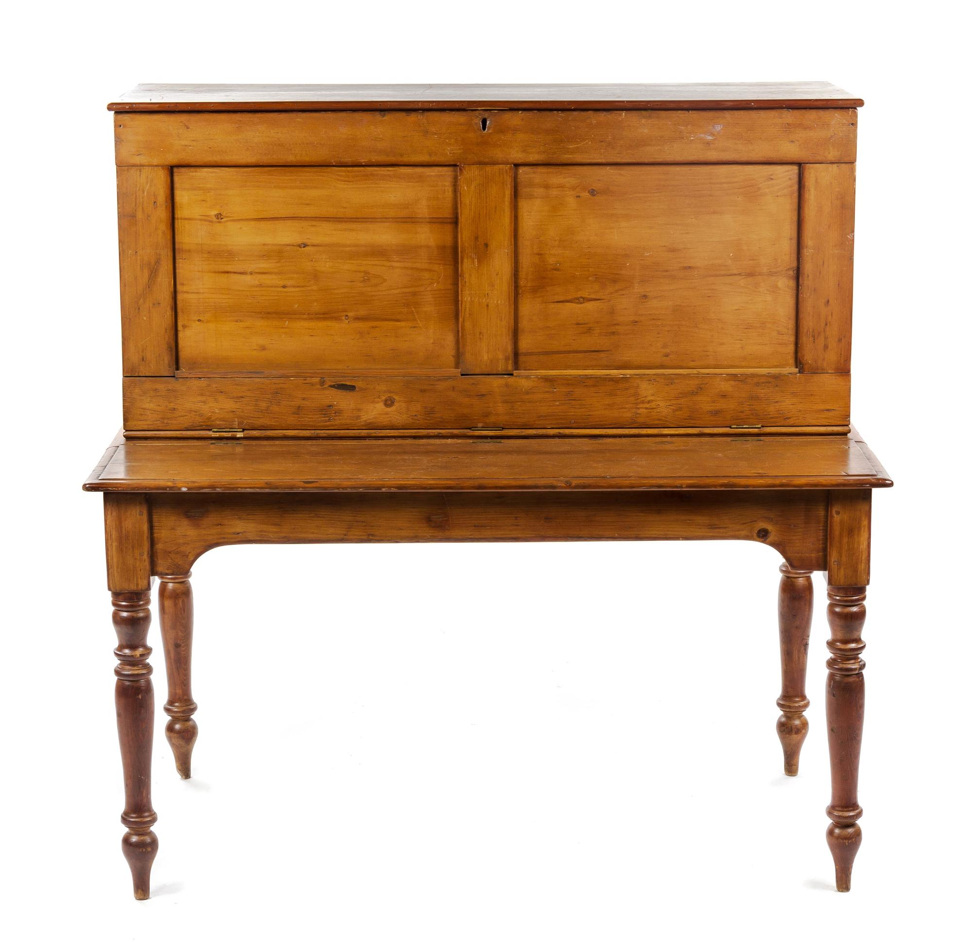 An American Pine Schoolmaster's Desk, MID-19TH CENTURY, Height 50 1/2 x width 48 3/4 x depth 29 1/4 inches. — MID-19TH CENTURY,