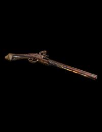 An Engraved Brass-Mounted Flintlock Pistol