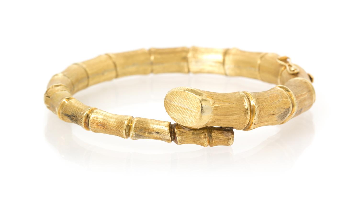 A Yellow Gold Bamboo Motif Bangle Bracelet, 28.70 dwts.