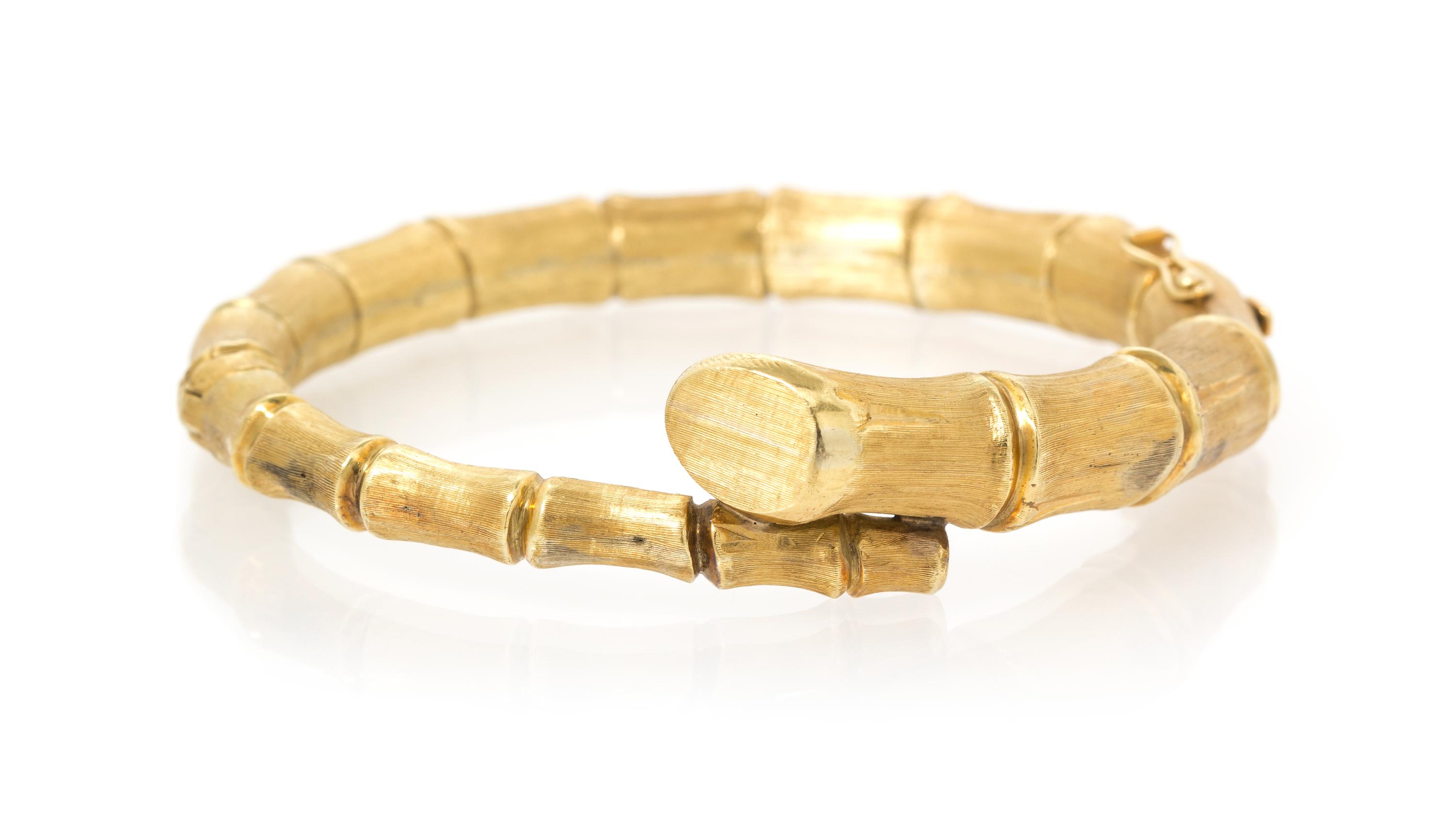 A Yellow Gold Bamboo Motif Bangle Bracelet, 28.70 dwts.