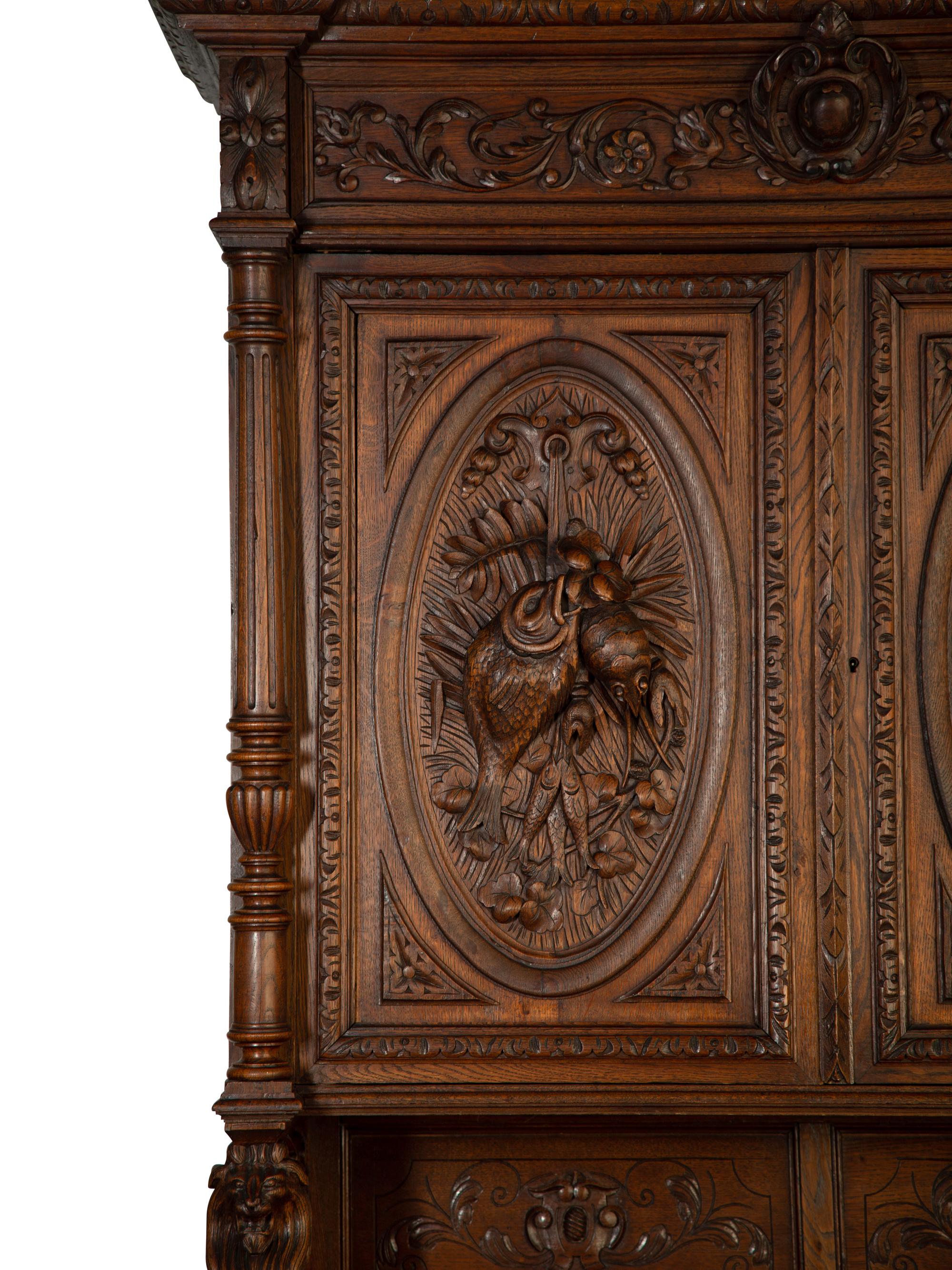 A German Carved Oak Hunt Cabinet