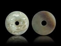 Two Jade Bi- Form Pendants