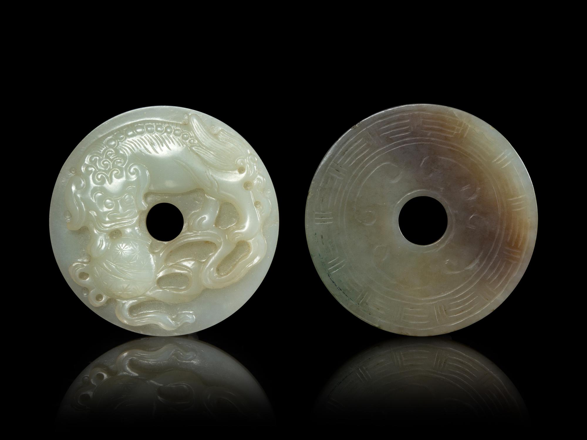 Two Jade Bi- Form Pendants