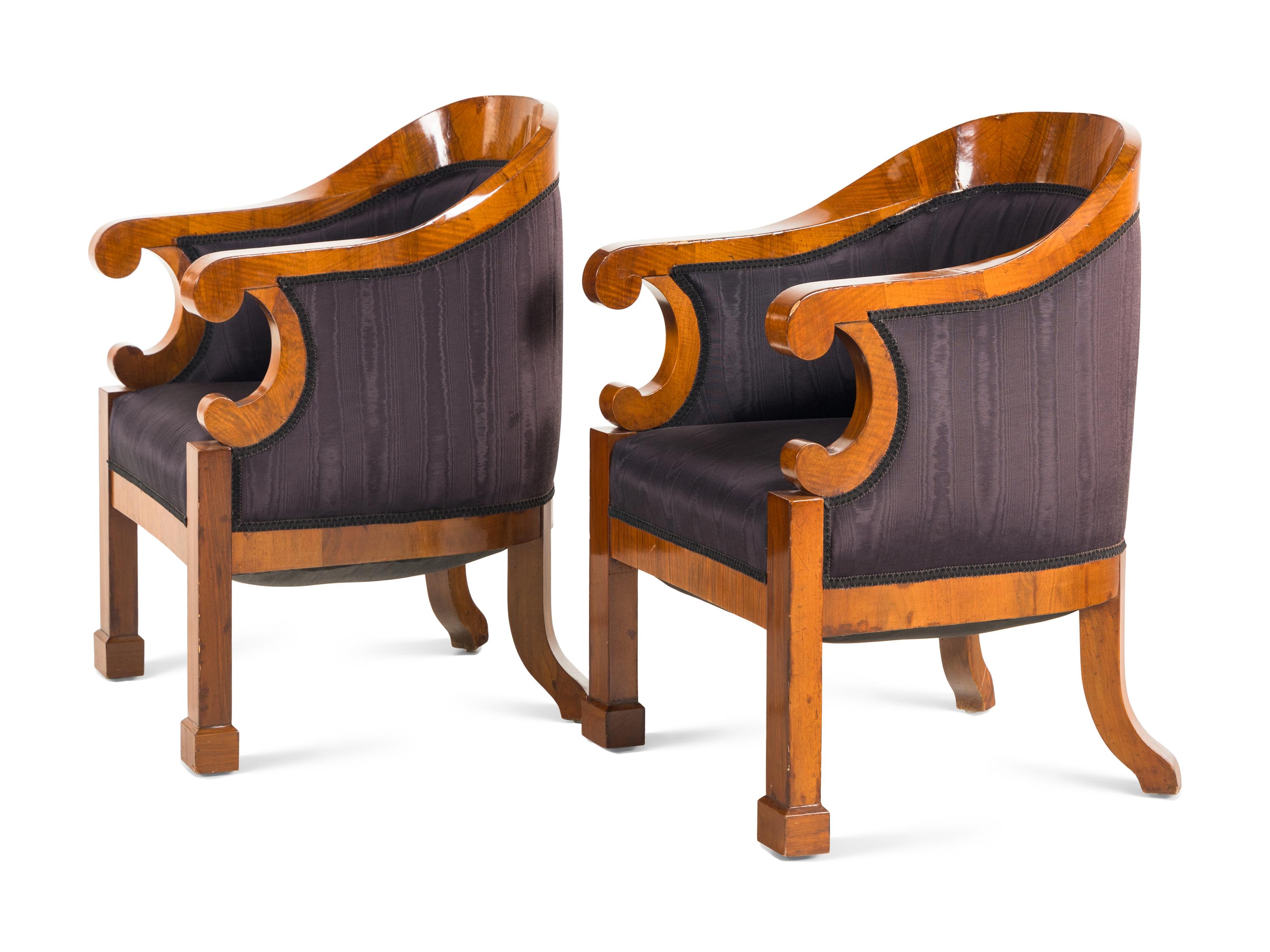 A Pair of Biedermeier Walnut Bergères