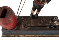 A Hubley "Trick Dog" Cast Iron Mechanical Bank