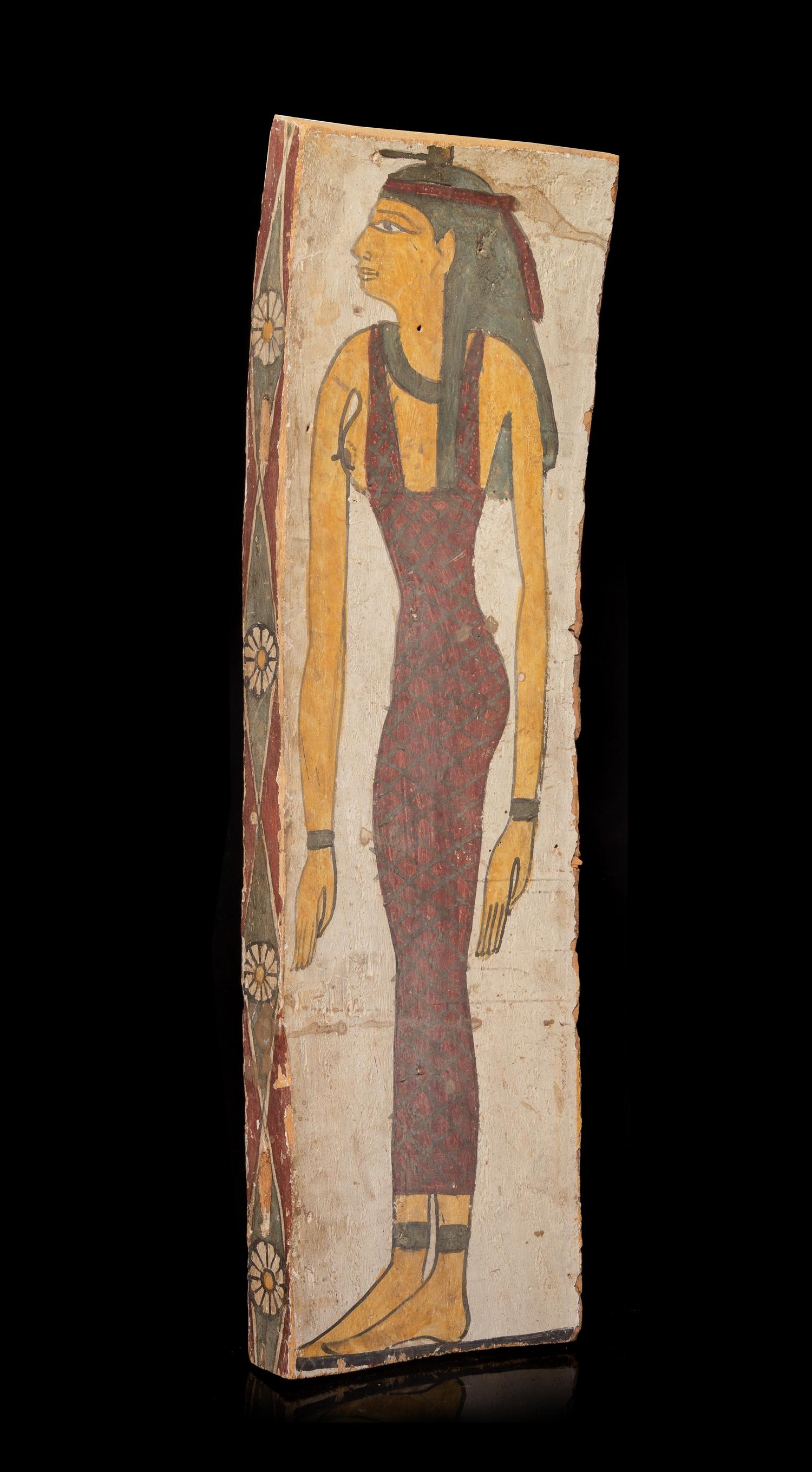 An Egyptian Painted Wood Coffin Panel Height 37 x width 10 1/2 inches. — LATE PERIOD TO PTOLEMAIC PERIOD, 664-30 B.C.E.
