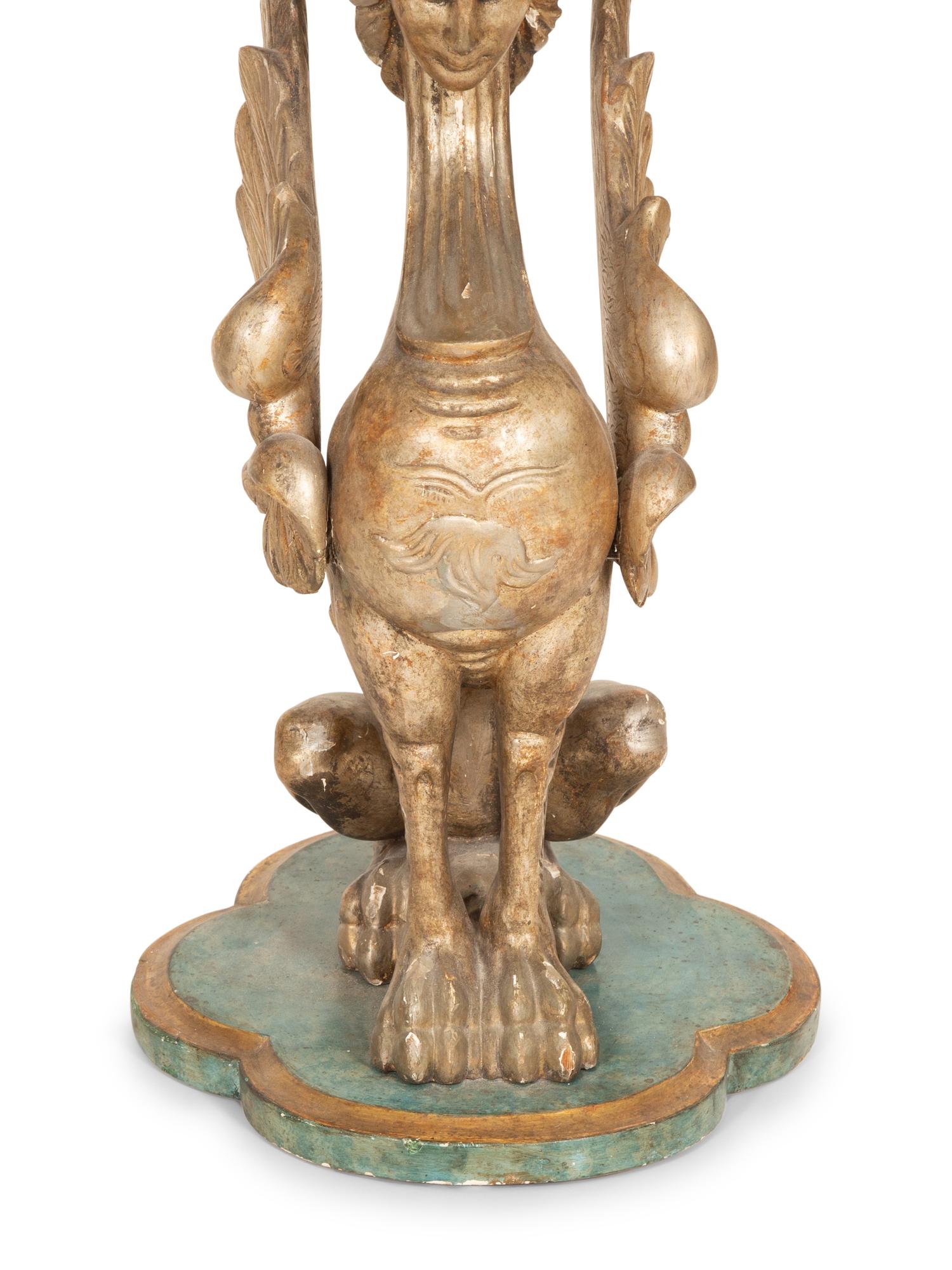 A Pair of Italian Painted and Parcel Gilt Figural Side Tables