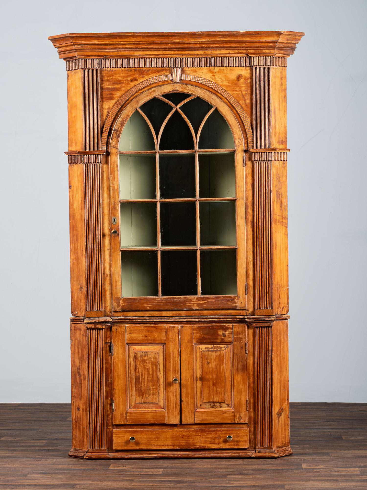 A Chippendale Carved and Stained Pine Corner Cupboard