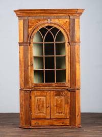 A Chippendale Carved and Stained Pine Corner Cupboard