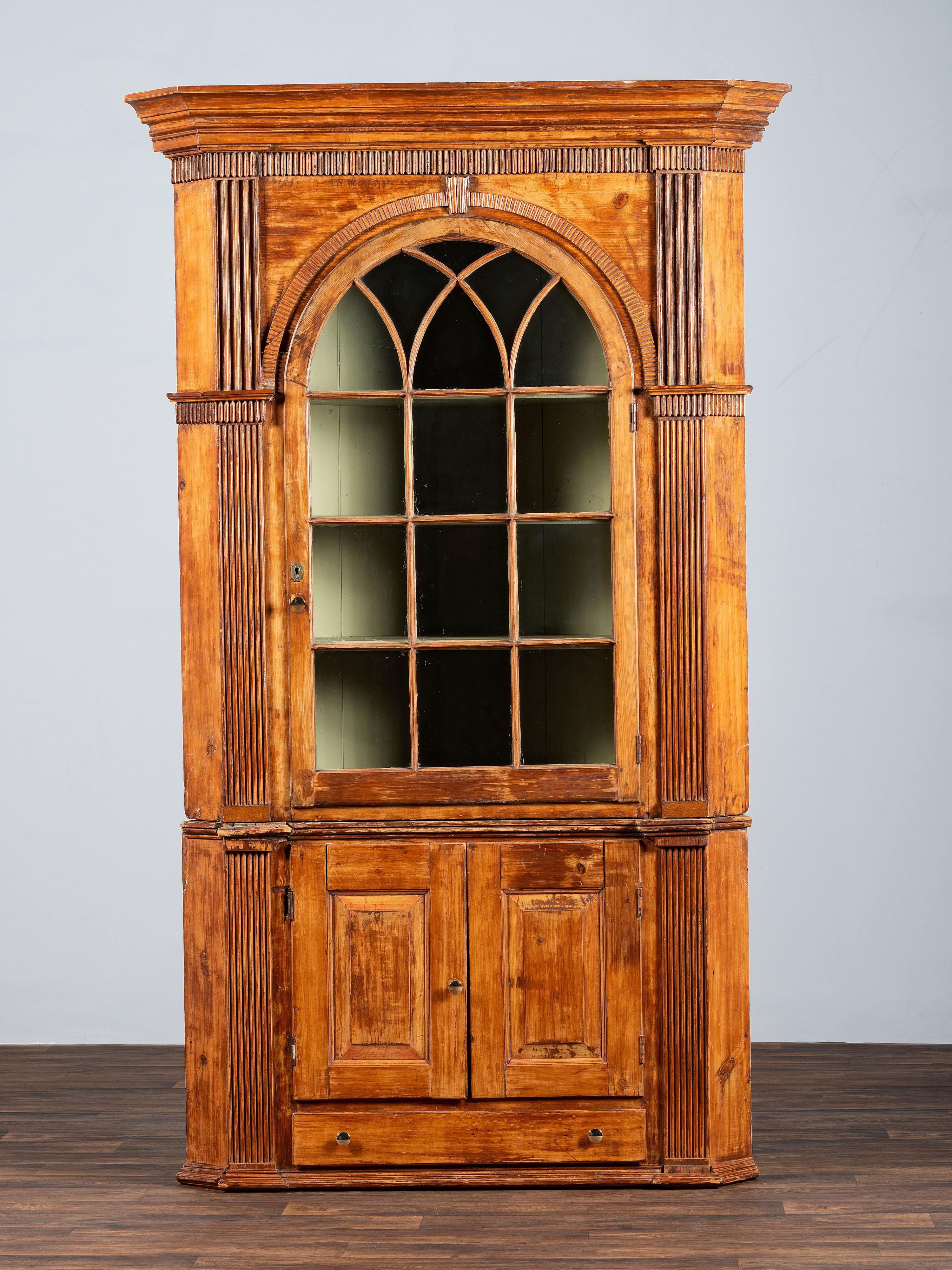 A Chippendale Carved and Stained Pine Corner Cupboard