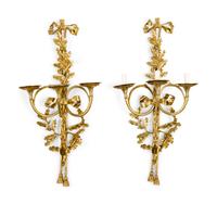 A Pair of Louis XVI Style Gilt Metal Three-Light Wall Sconces