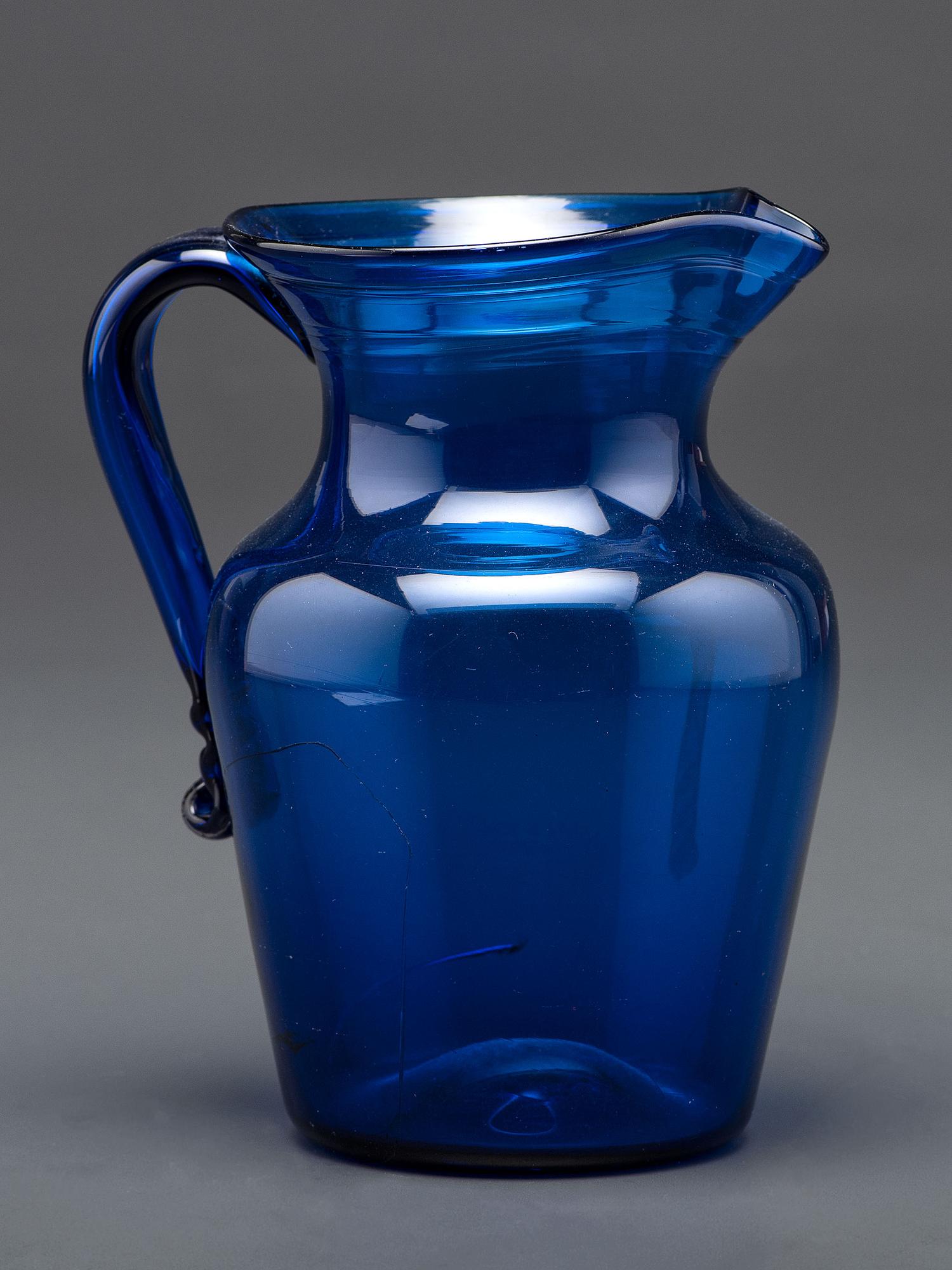 A Midwestern Glass Pitcher in Blue