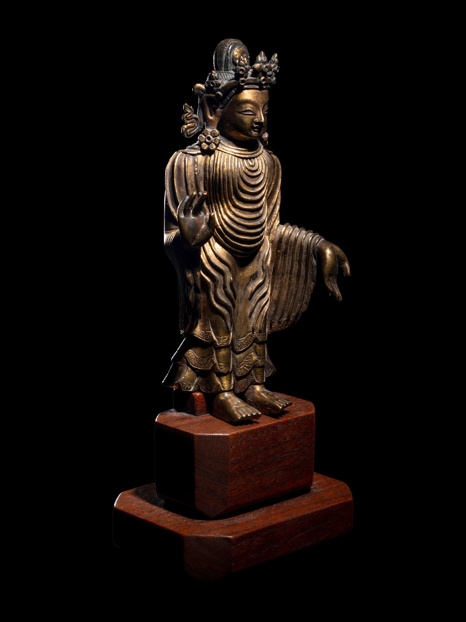 A Gilt Bronze Figure of Buddha