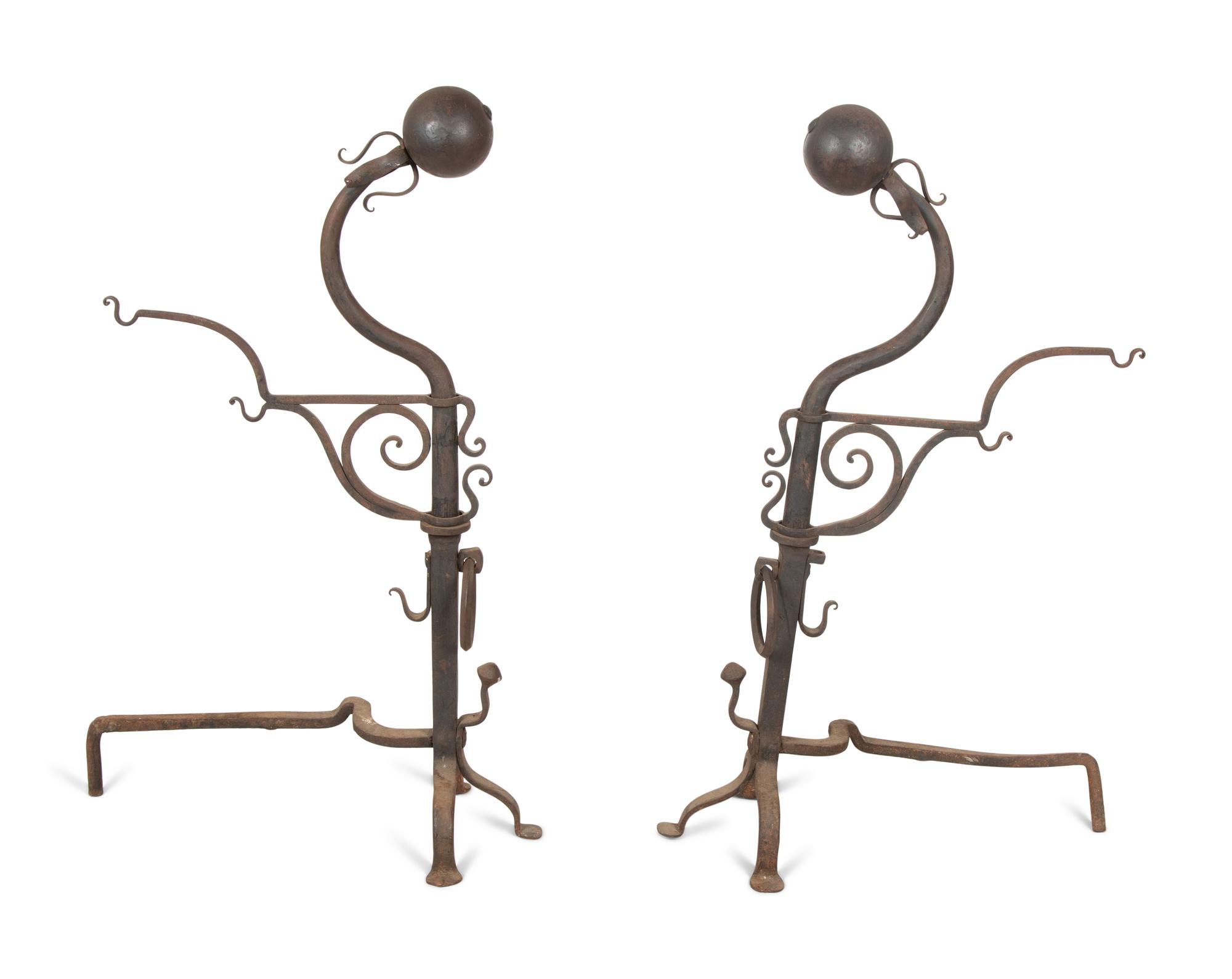 A Pair of Continental Iron Large Andirons — 19TH CENTURY