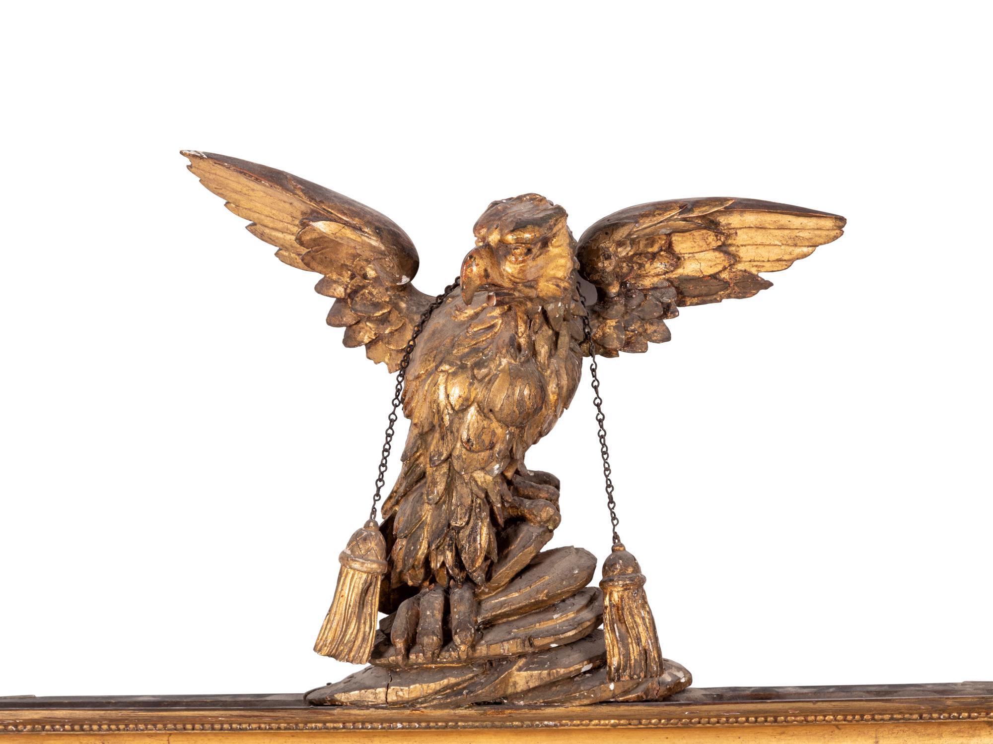 A George III Style Giltwood Mirror with an Eagle Finial