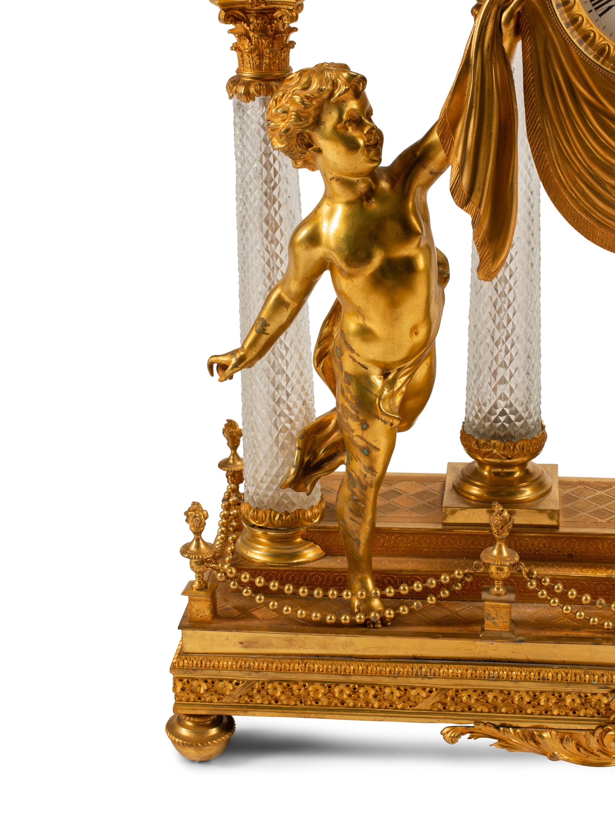 A Louis XV Style Gilt Bronze, Porcelain and Cut Glass Clock Garniture