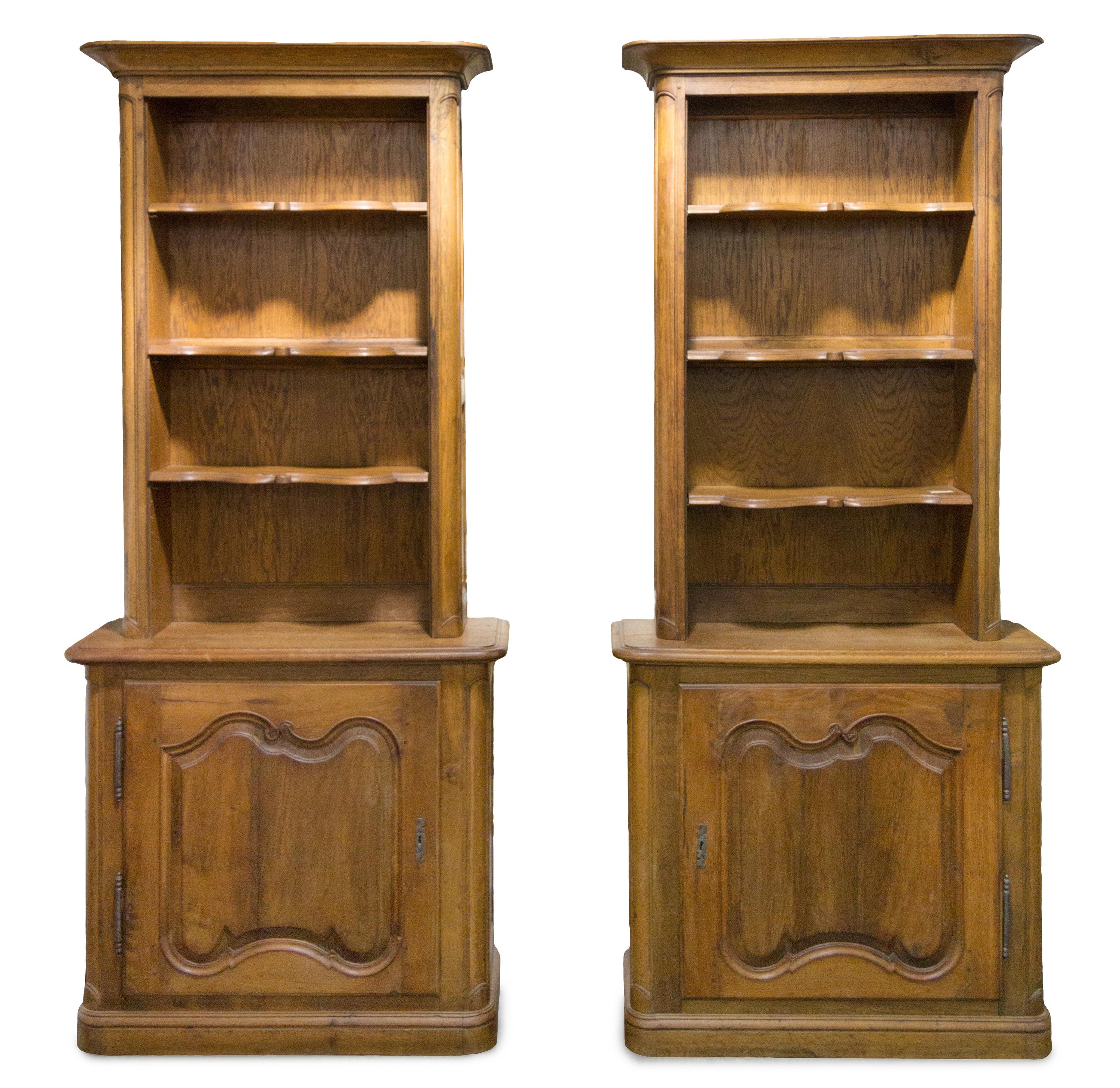 A Pair of French Provincial Style Book Cases Height 91 3/4 x width 38 1/4 x depth 15 inches.