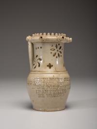 An Incised and Impressed Stoneware Puzzle Jug