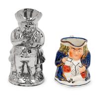 A Staffordshire Squat Toby Jug and a Silver Luster "Snuff Taker" Toby Jug
