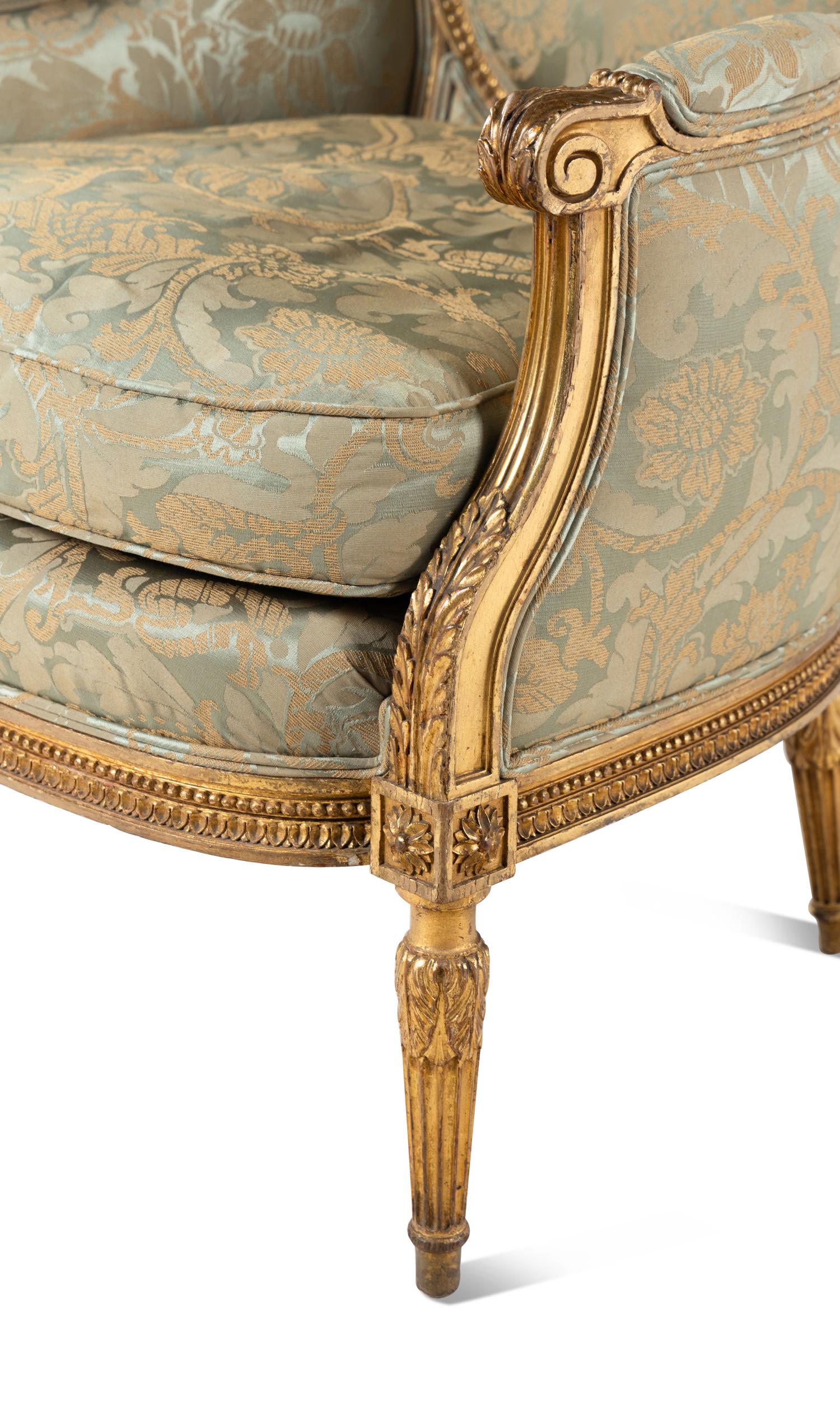 A Pair of Louis XVI Style Damask-Upholstered Giltwood Bergères