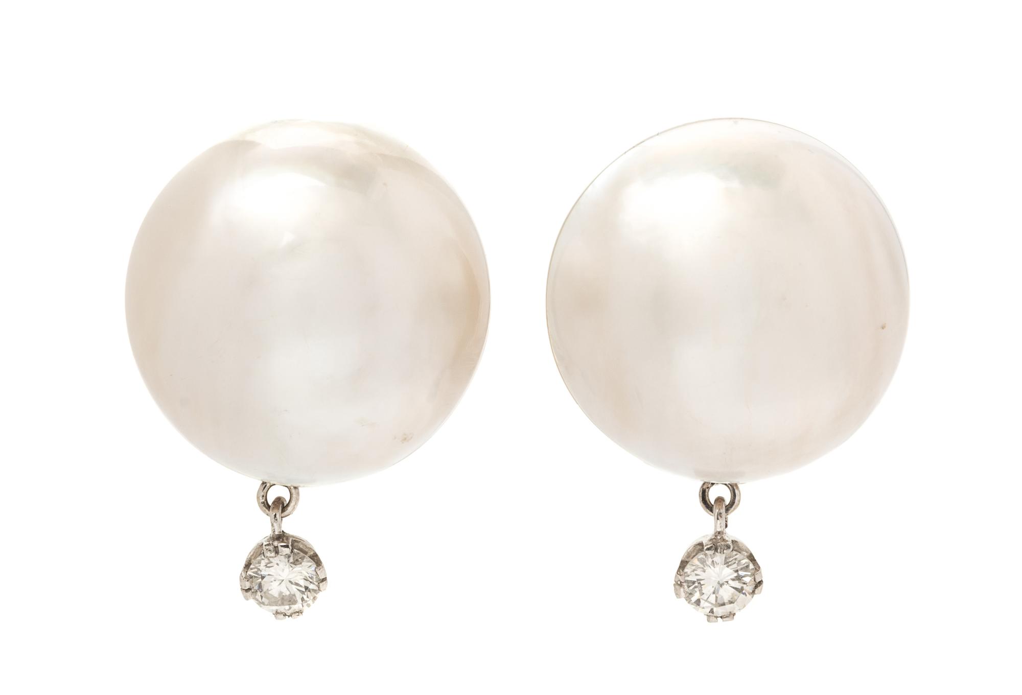 A Pair of White Gold, Mabe Pearl and Diamond Earclips, 8.90 dwts.