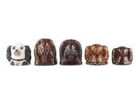 Five Figural Banks and Window Stops
