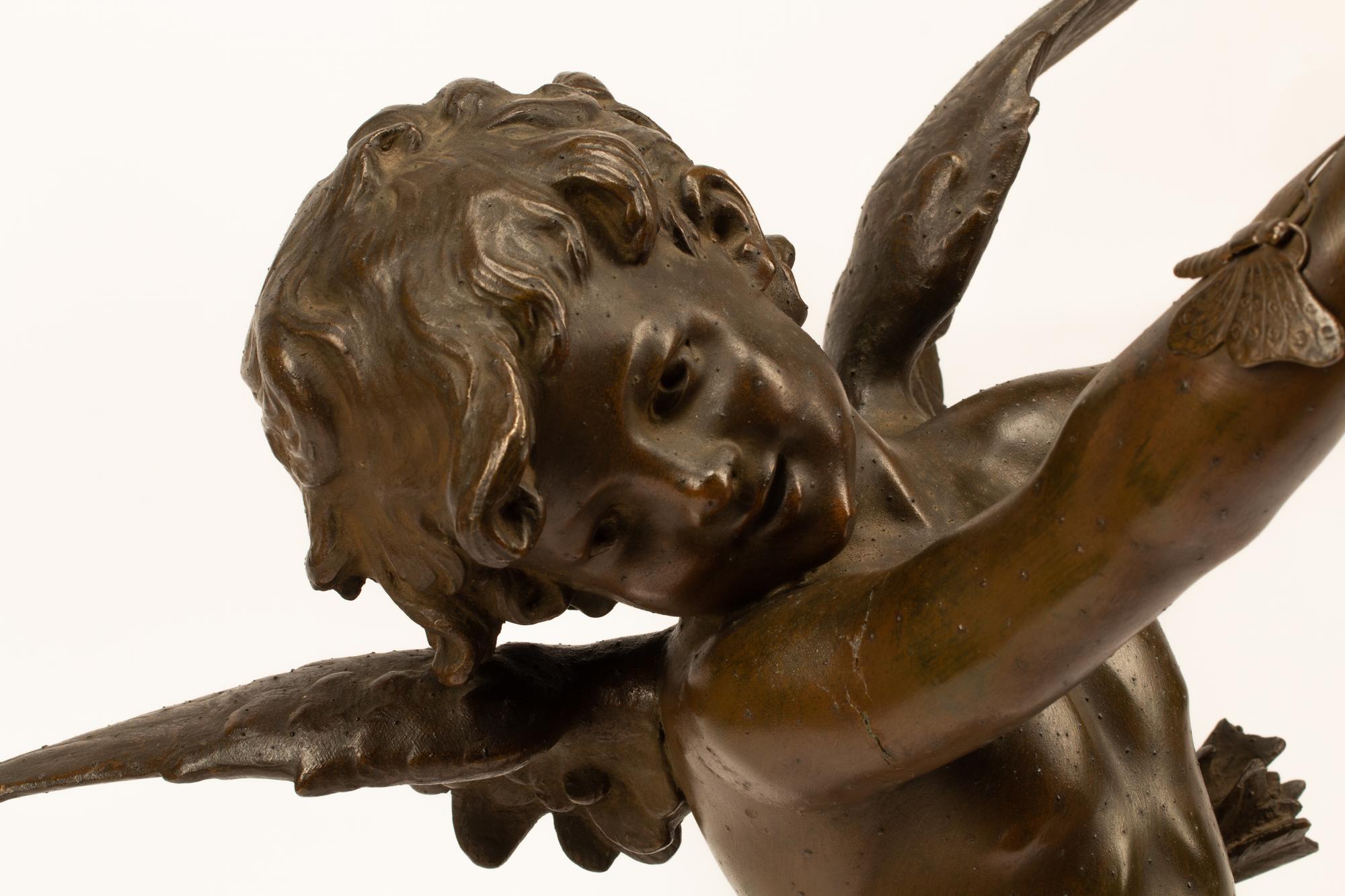 A French Patinated Bronze Figure of a Boy After Moreau