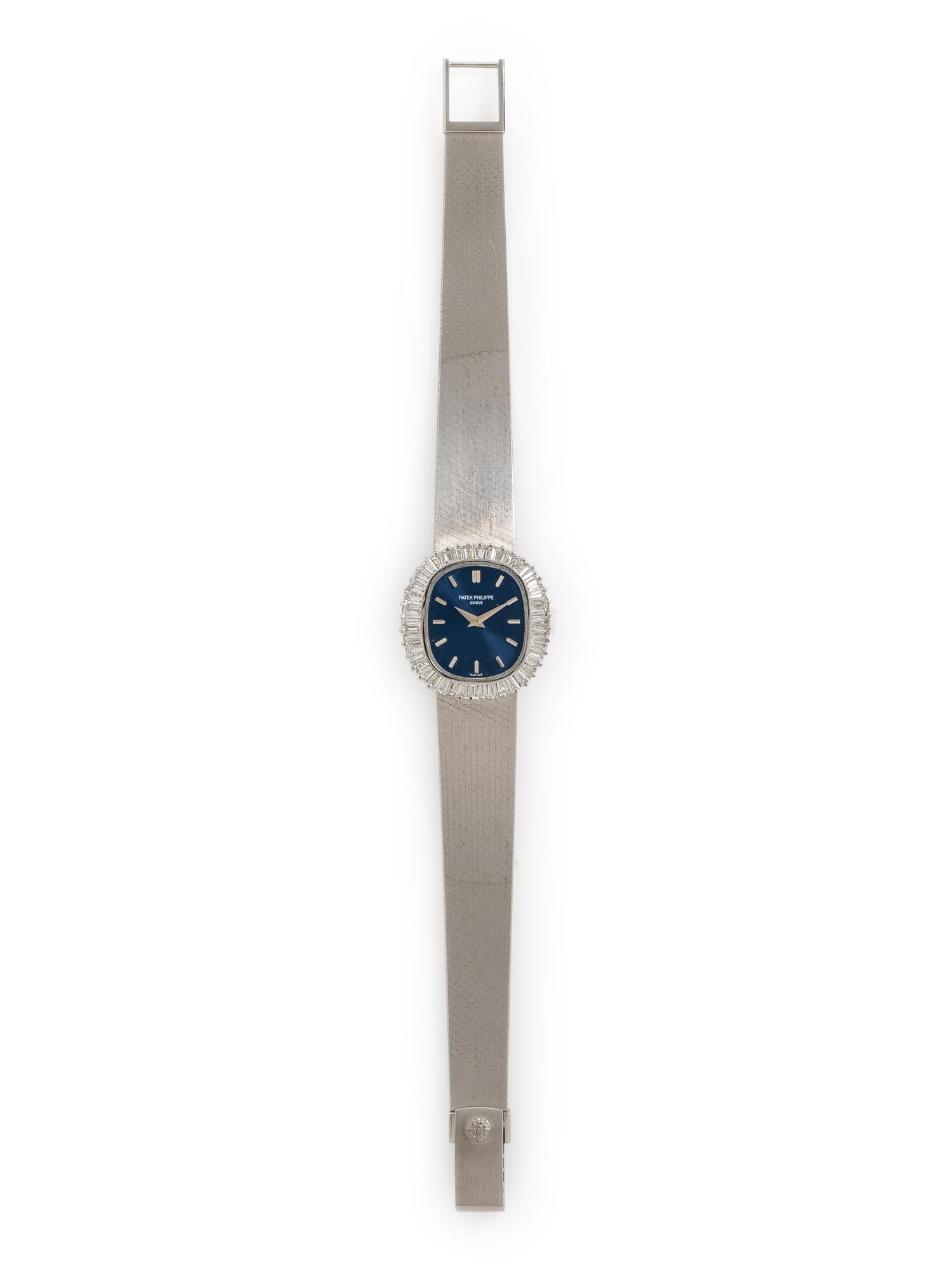 PATEK PHILIPPE, REF. 4138/1 18K WHITE GOLD AND DIAMOND WATCH