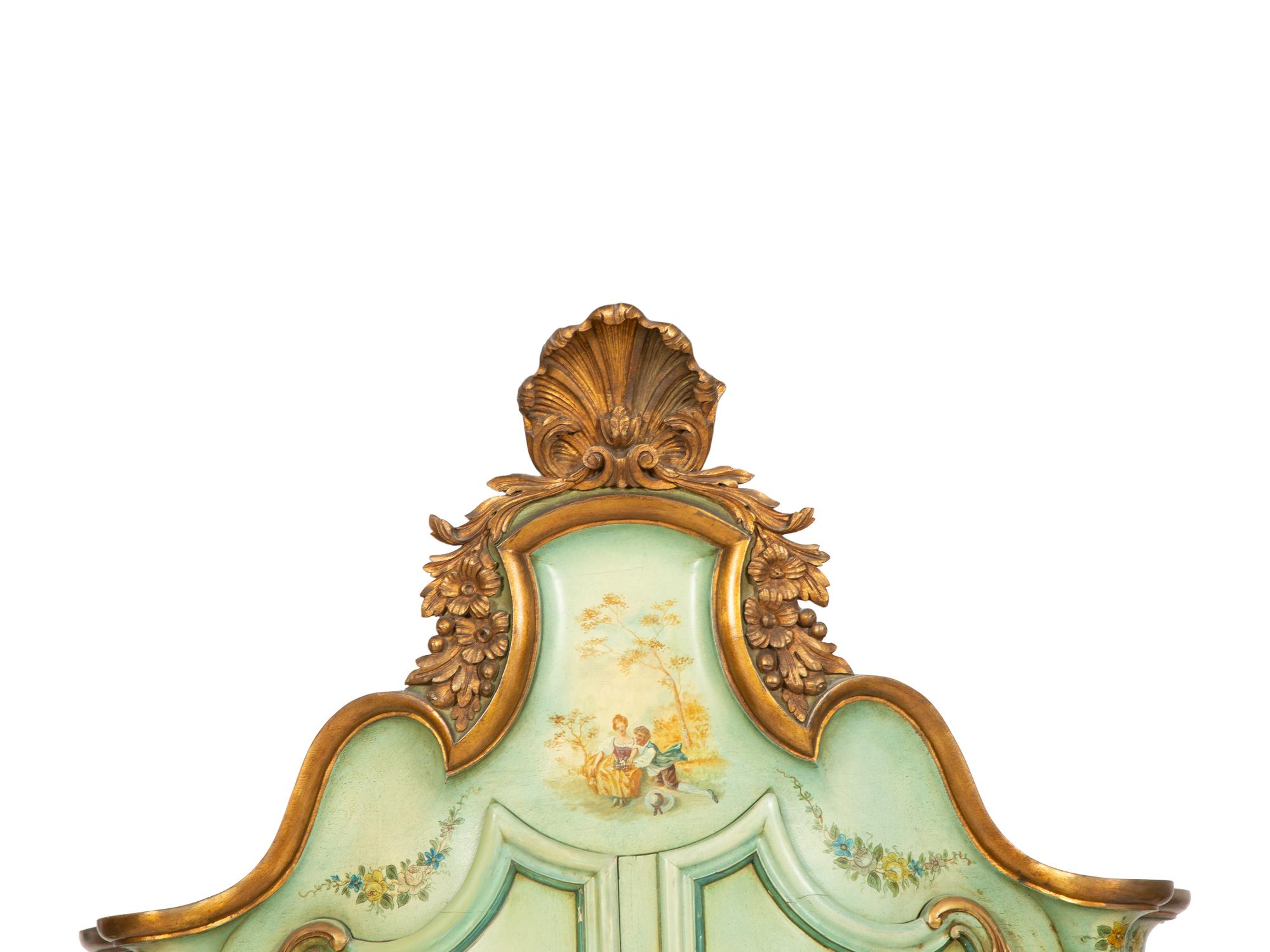 A Venetian Style Painted and Parcel Gilt Cabinet on Stand
