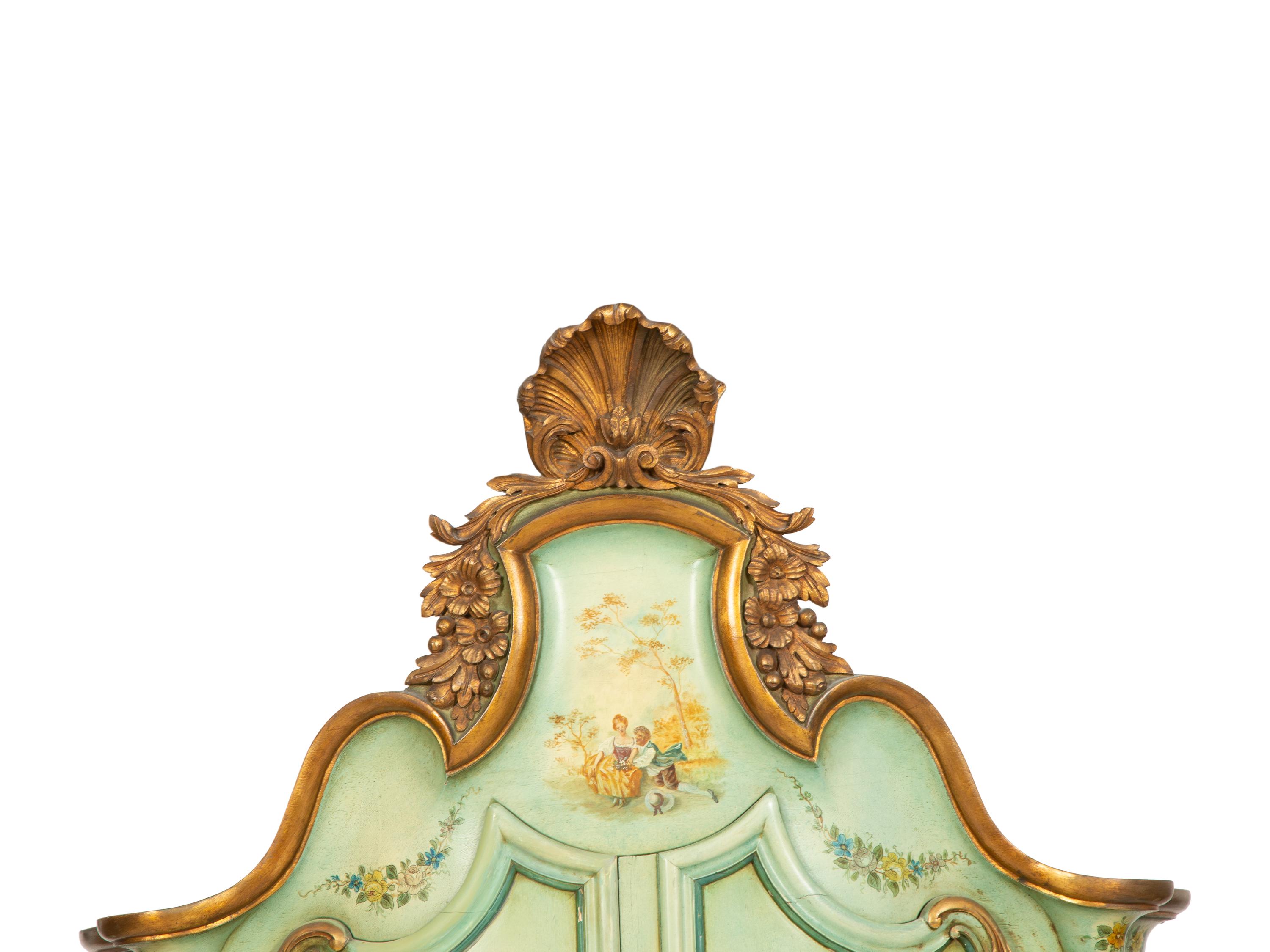 A Venetian Style Painted and Parcel Gilt Cabinet on Stand