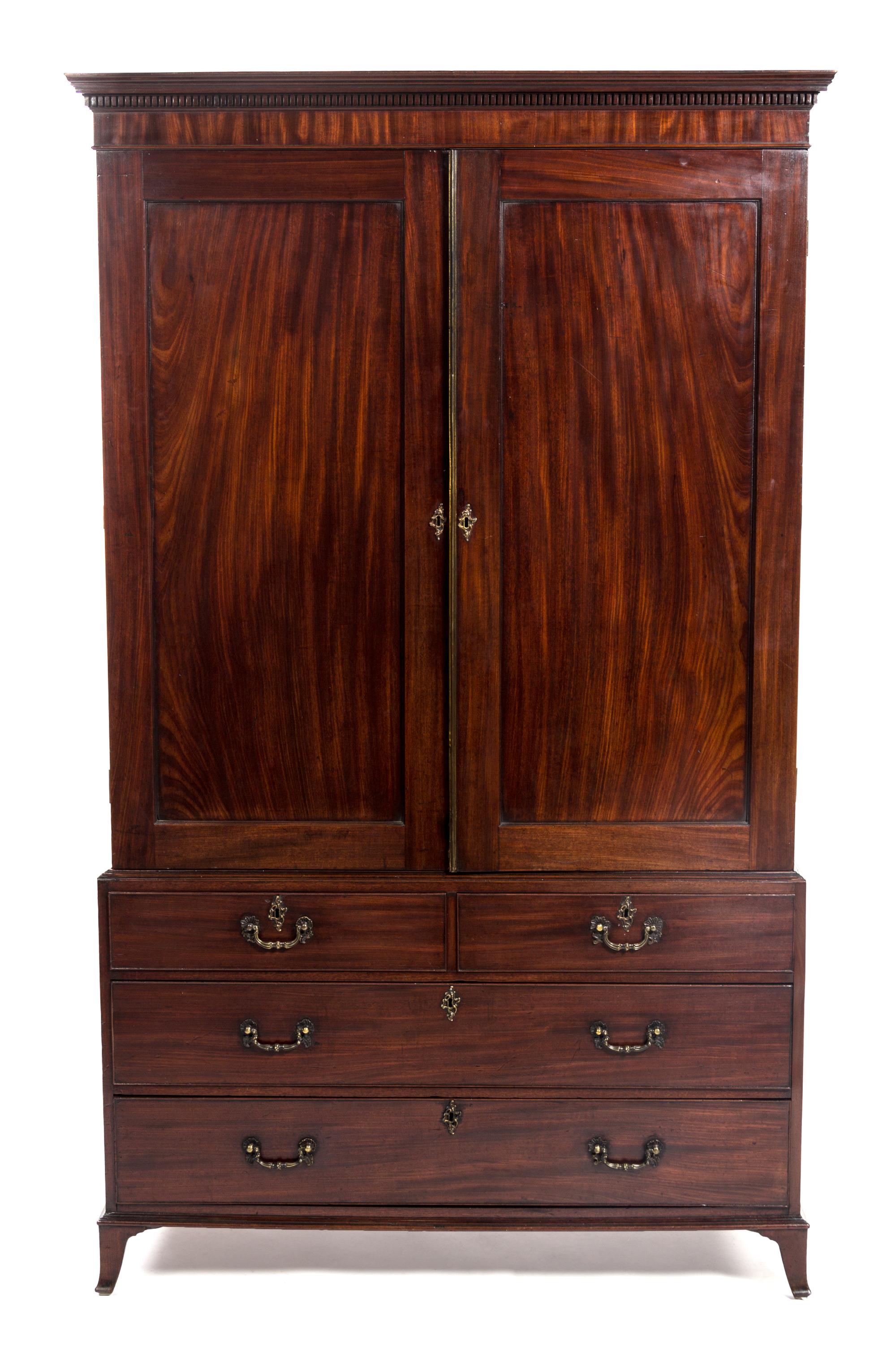 A George III Mahogany Linen Press, EARLY 19TH CENTURY, Height 84 x width 49 x depth 24 1/4 inches. — EARLY 19TH CENTURY,