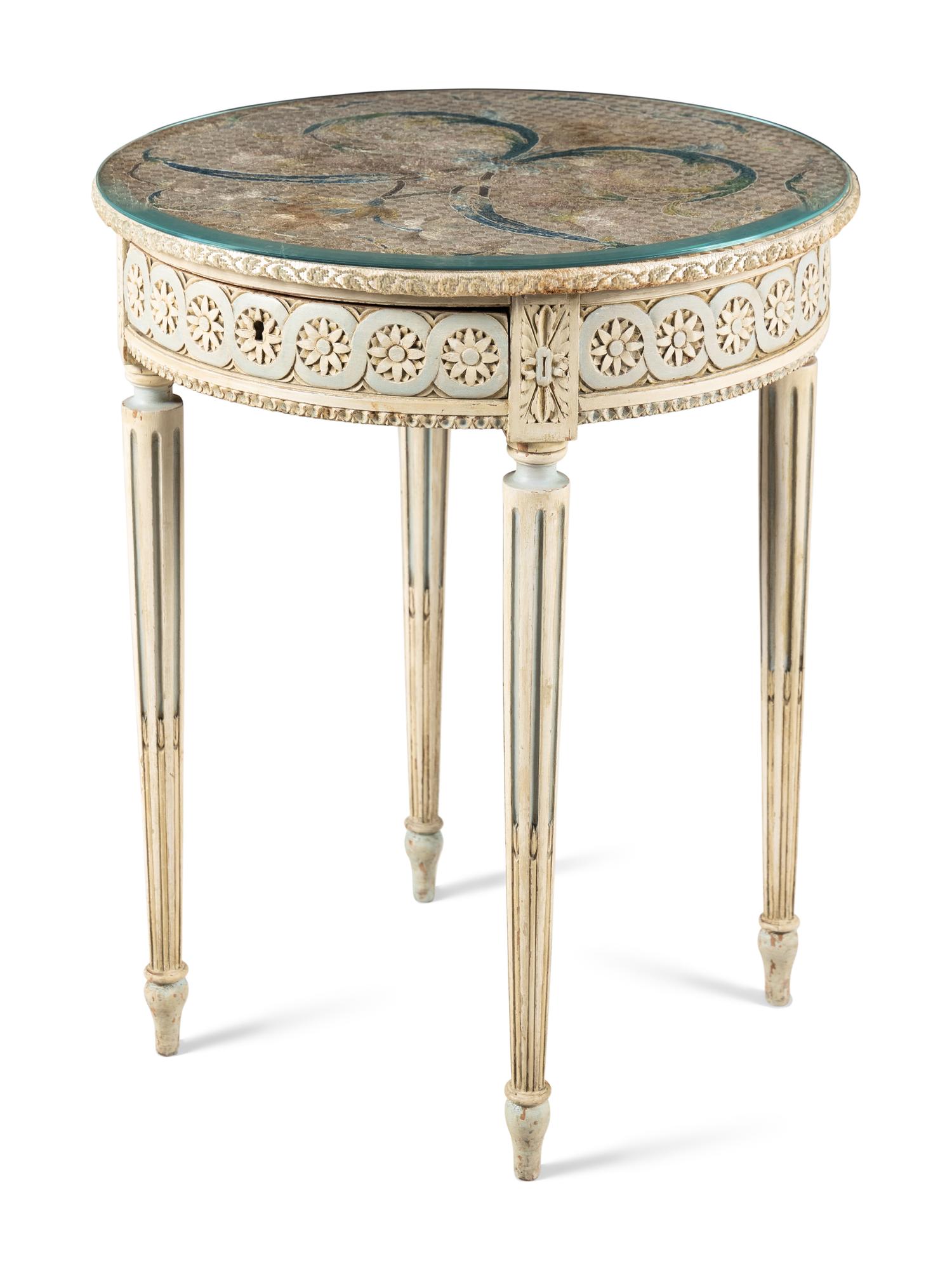 A French Table with an Embroidered Top