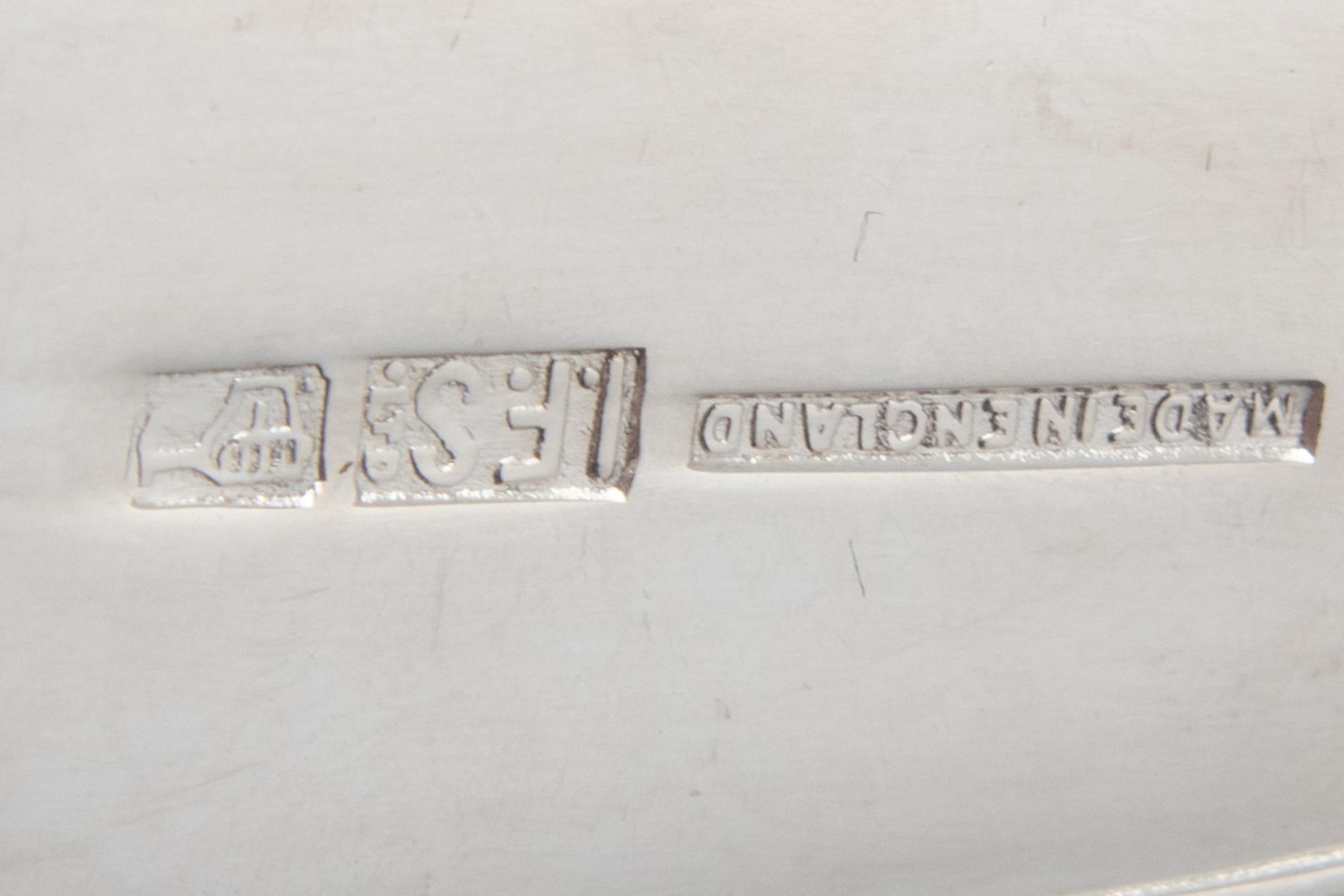 A Collection of Silver and Silver-Plate Flatware Articles
