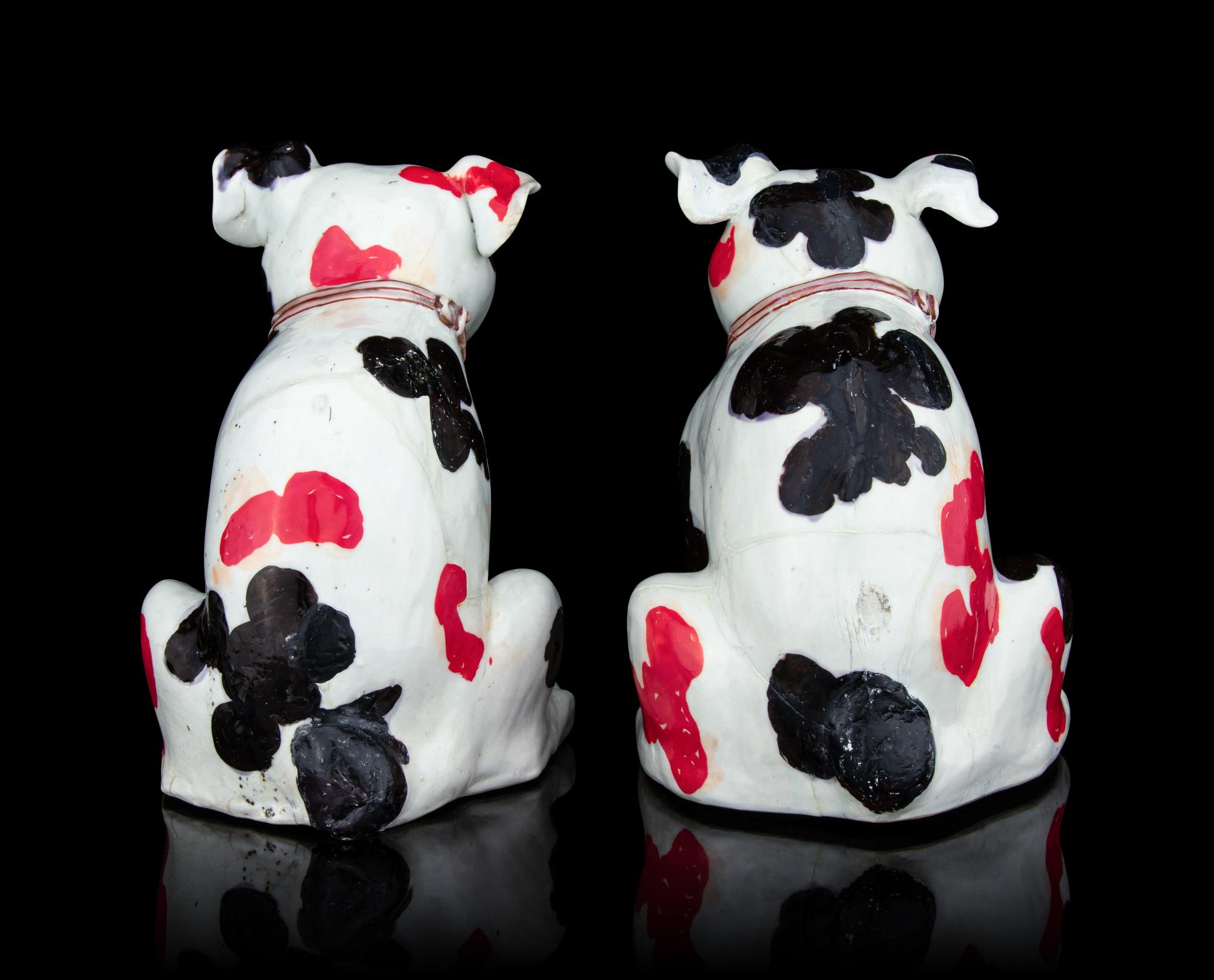 A Pair of Japanese Arita Figures of Puppies