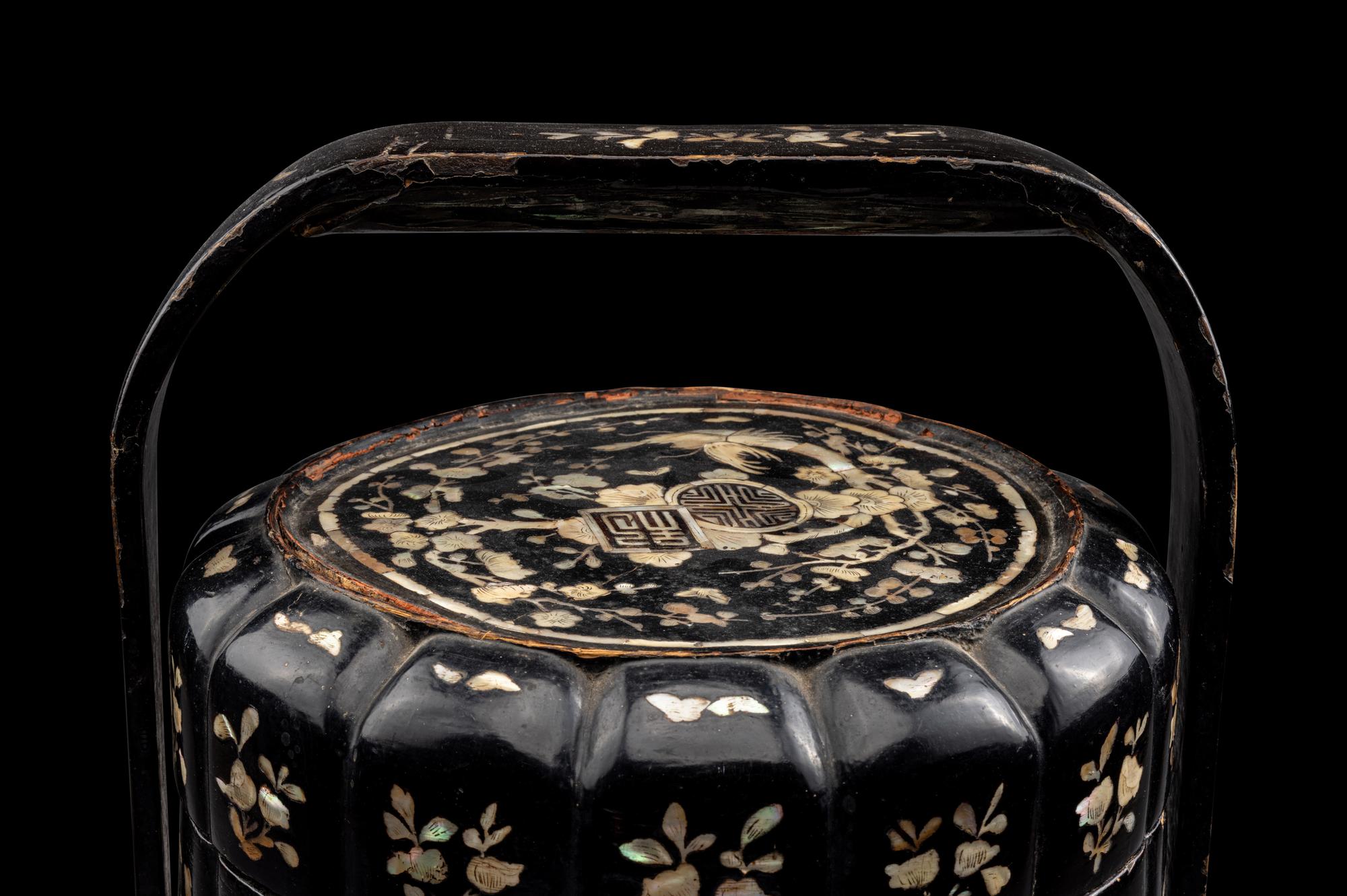 A Chinese Mother-of-Pearl Inlaid Black Lacquer Two-Tier Food Basket, Tihe