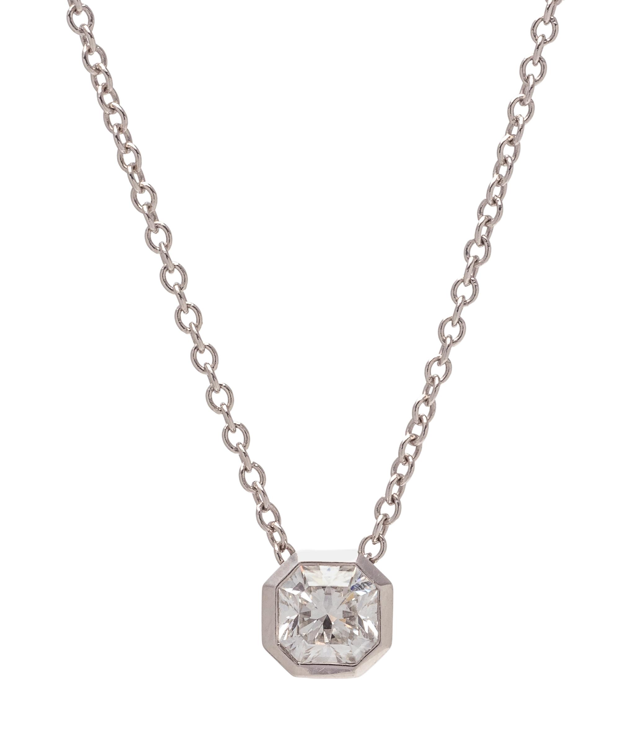 TIFFANY & CO., PLATINUM AND 'LUCIDA' DIAMOND PENDANT/NECKLACE