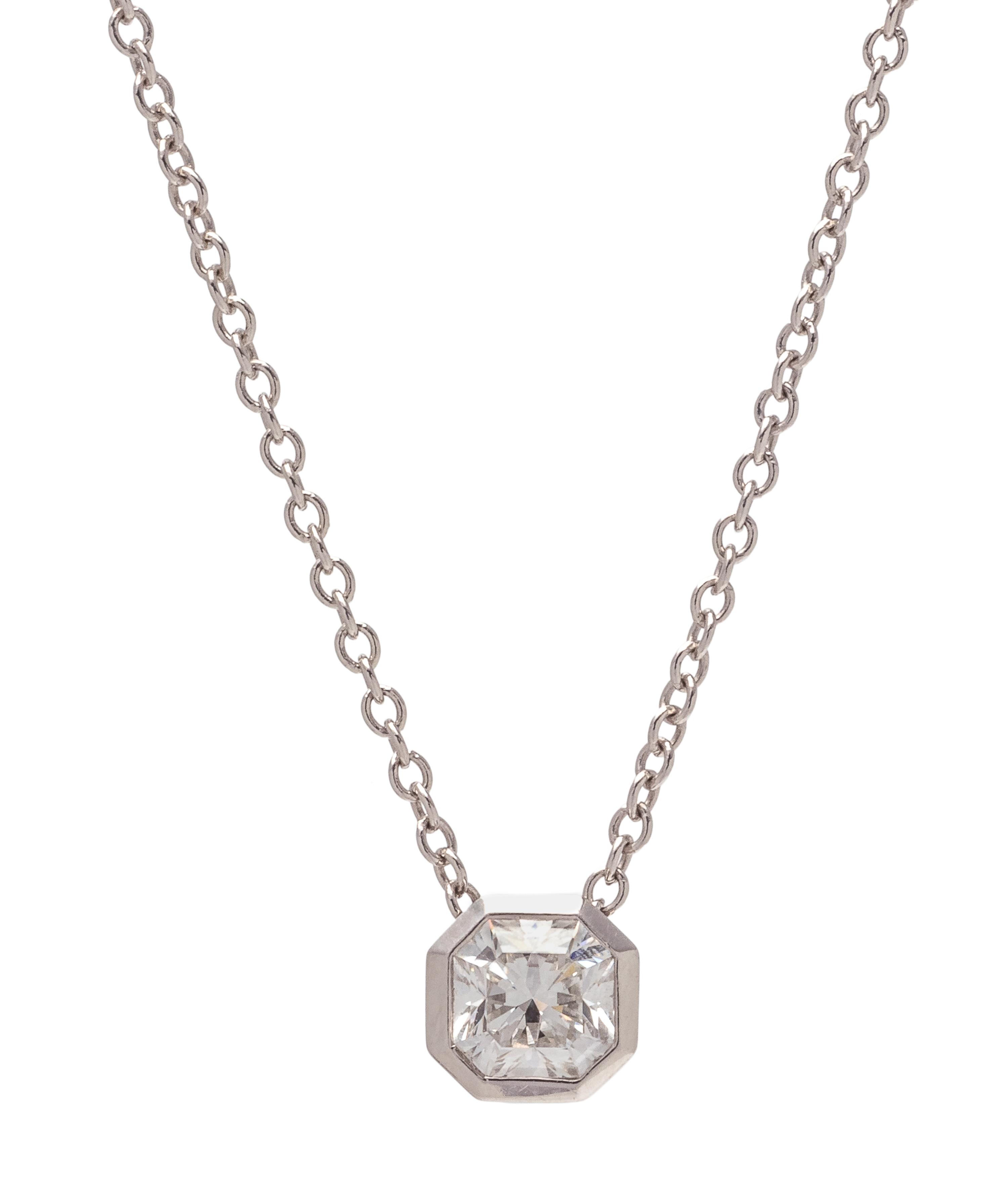 TIFFANY & CO., PLATINUM AND 'LUCIDA' DIAMOND PENDANT/NECKLACE
