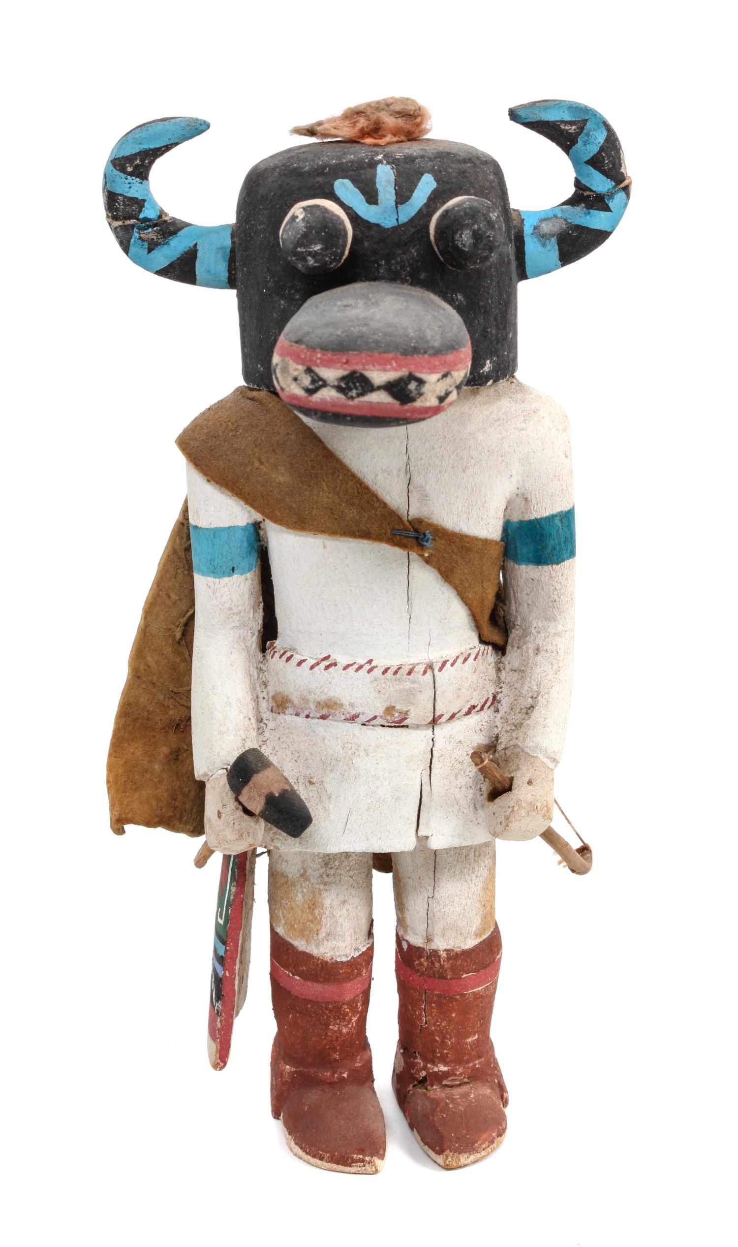 A Zuni Horned Ogre Kachina Height 8 1/2 inches.