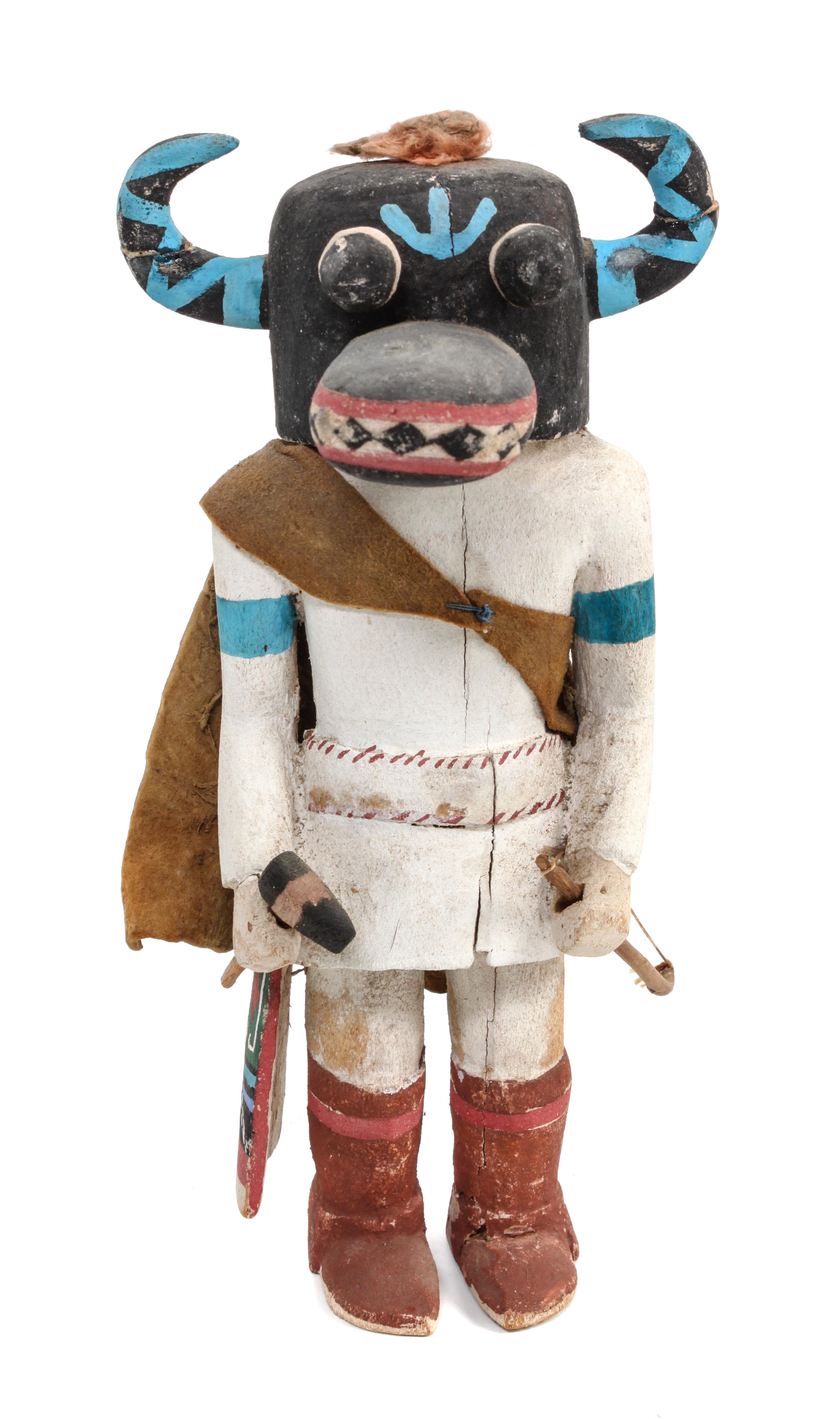 A Zuni Horned Ogre Kachina Height 8 1/2 inches.