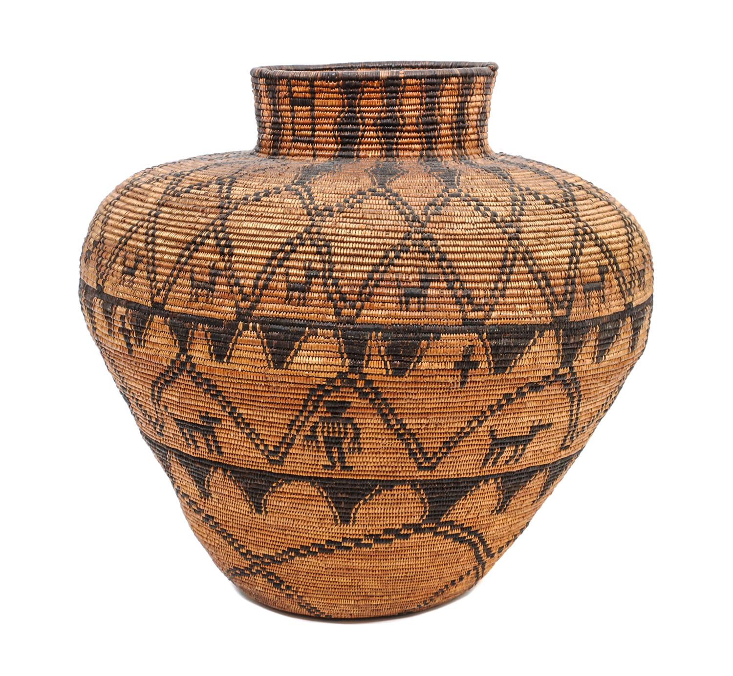 A Western Apache Pictorial Basket Height 21 1/2 x diameter 24 inches.