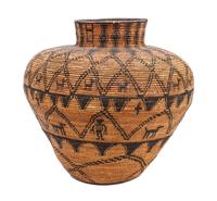 A Western Apache Pictorial Basket Height 21 1/2 x diameter 24 inches.