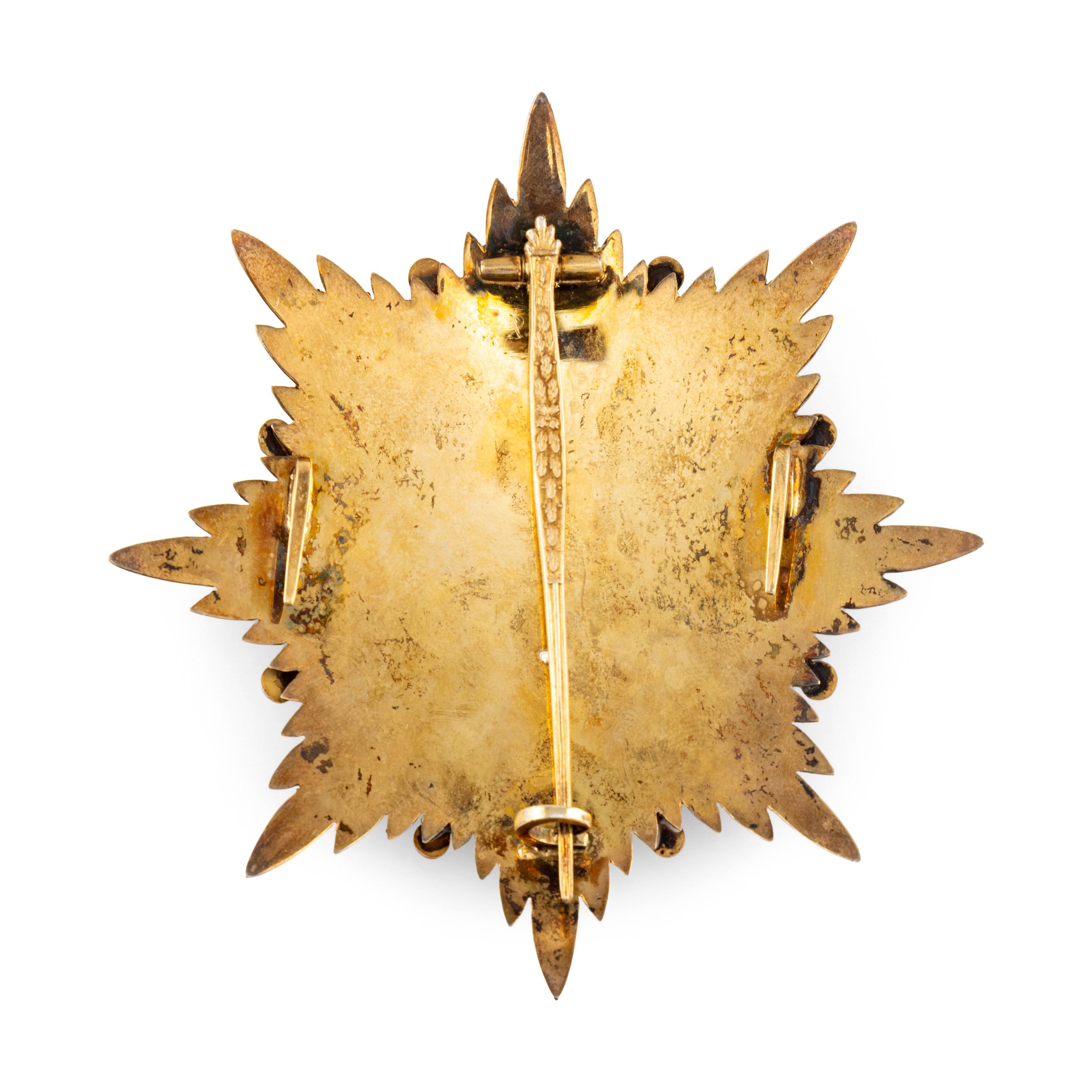 A Silver-Gilt and Enamel Knight's Badge of the Military and Hospitaller Order of St. Lazarus of Jerusalem