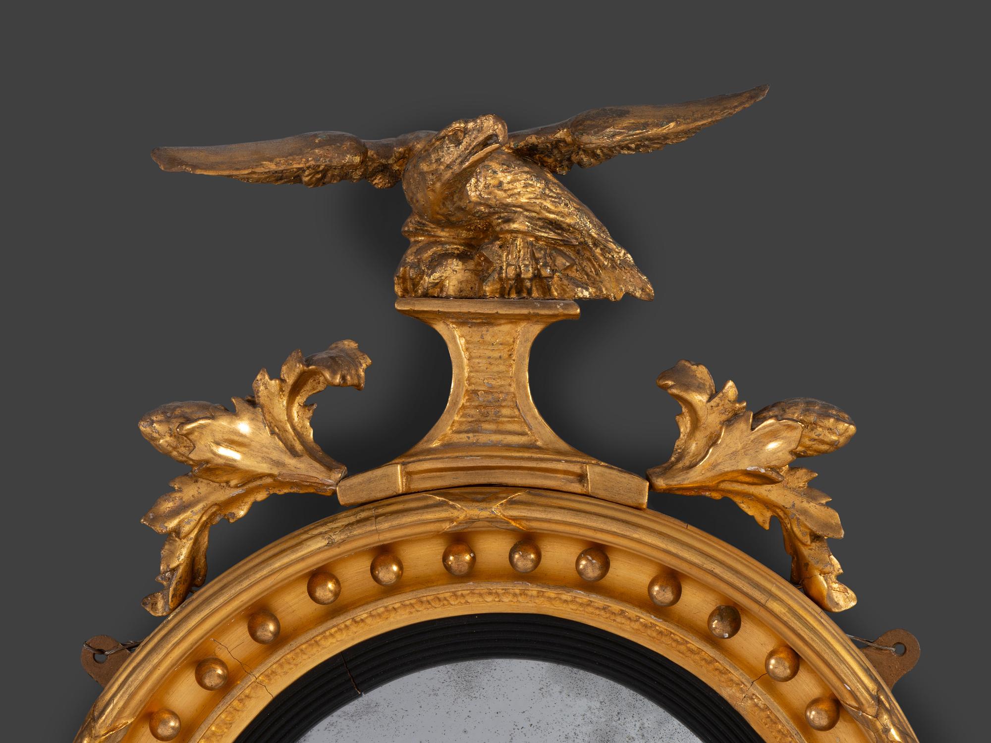 A Federal Giltwood Bull's Eye Mirror
