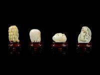 Four Chinese Jade Carvings of Fruits and Animals