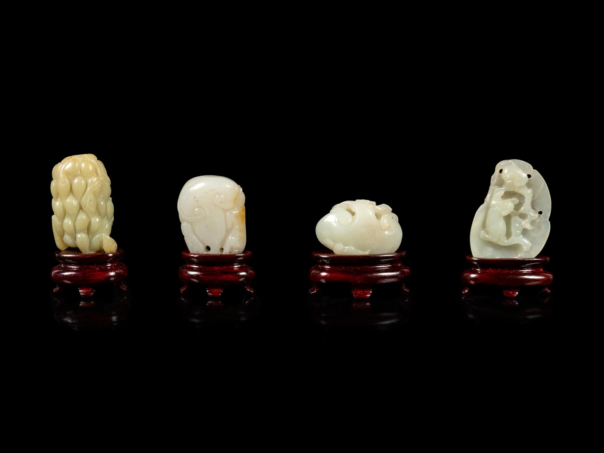 Four Chinese Jade Carvings of Fruits and Animals