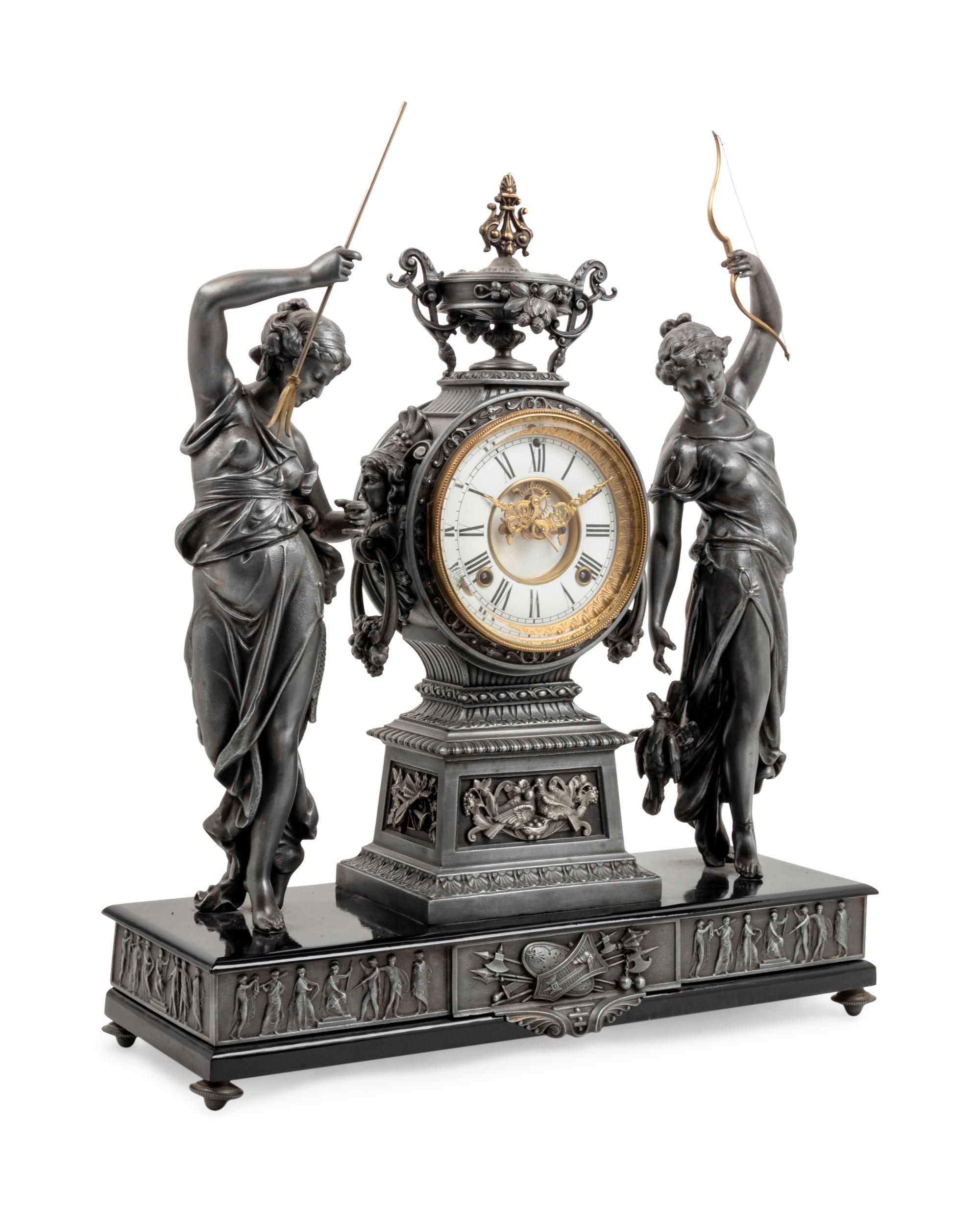 An Ansonia Fisher & Hunter Silvered Metal Mantel Clock